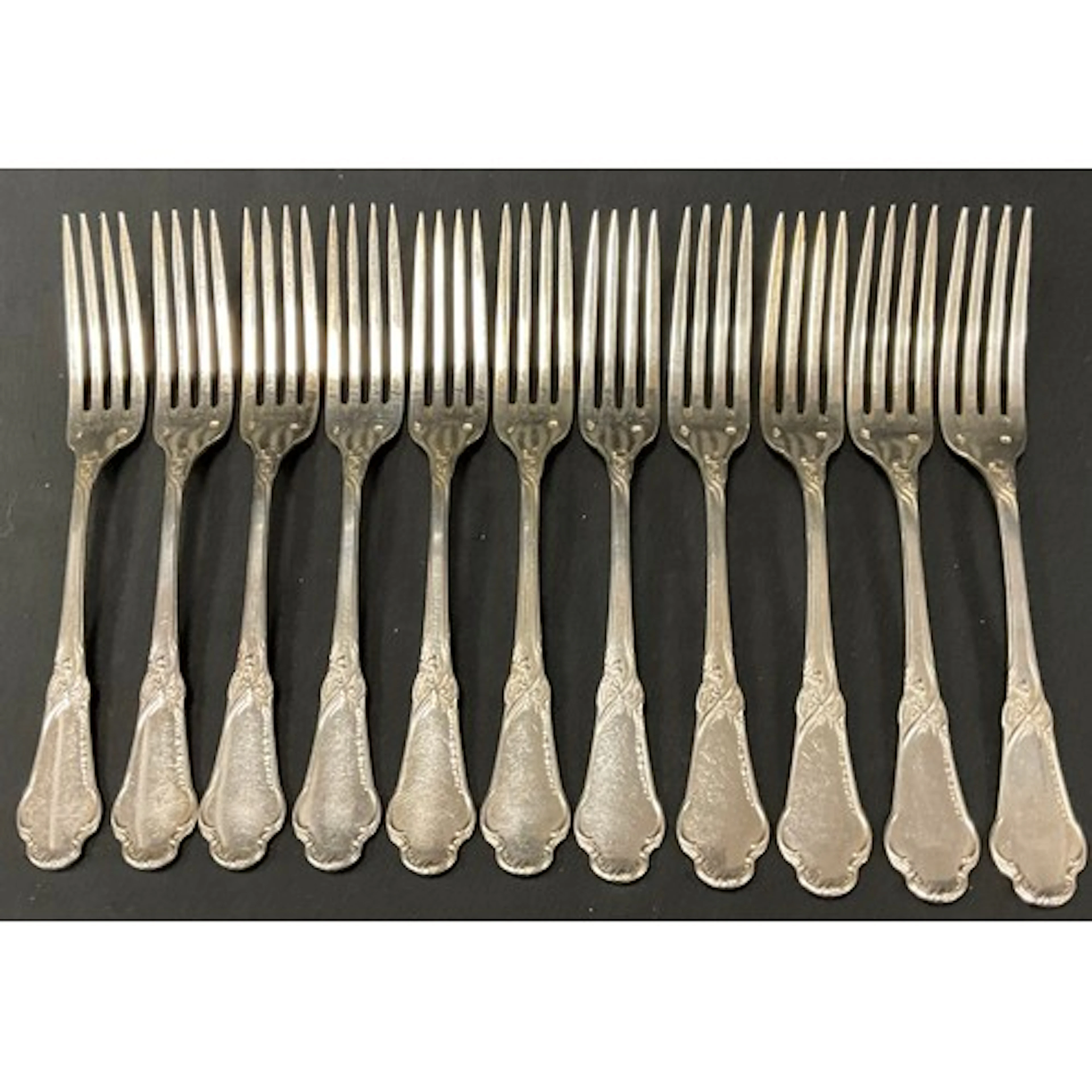 A set of twelve late 19th century French 950 standard silver...