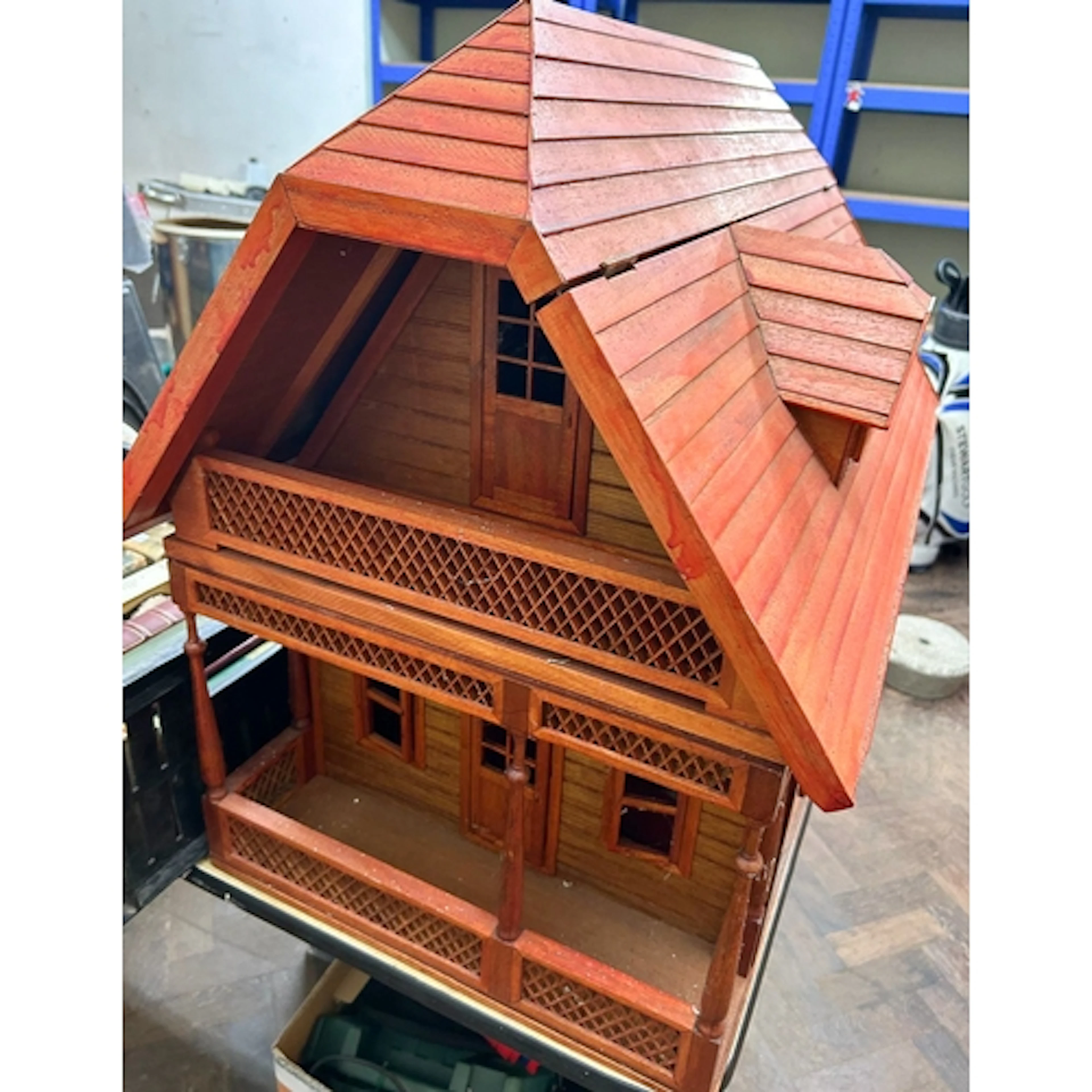A hand built wooden German style dolls house complete with t...