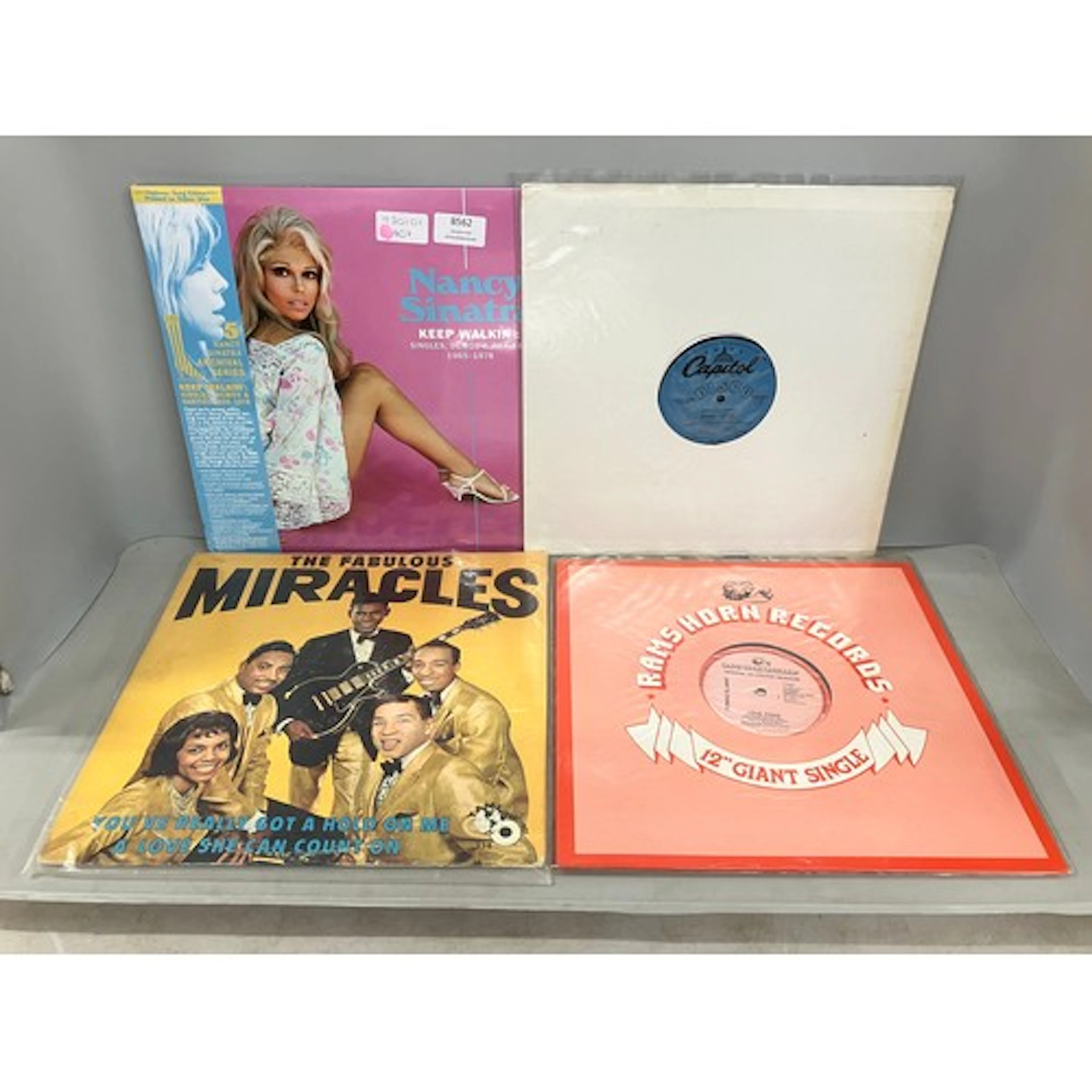 Ten vinyl LP records and 12" singles to include some for pro...