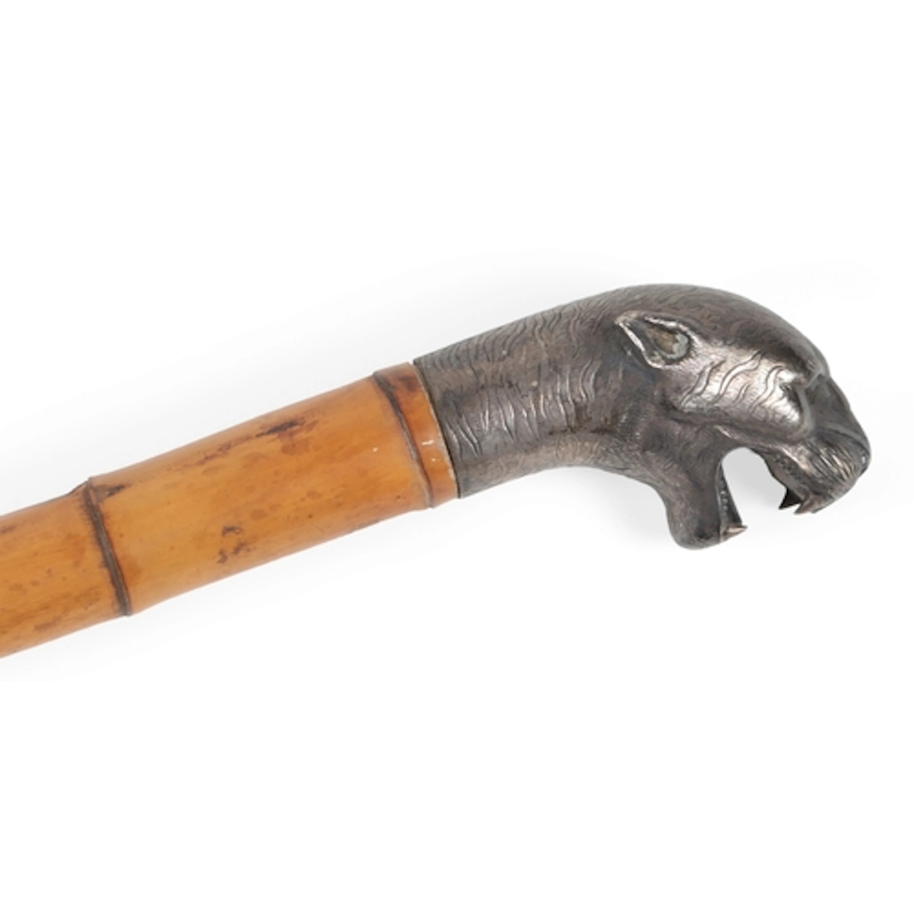Y An Indian white metal tiger's head handled walking cane, l...