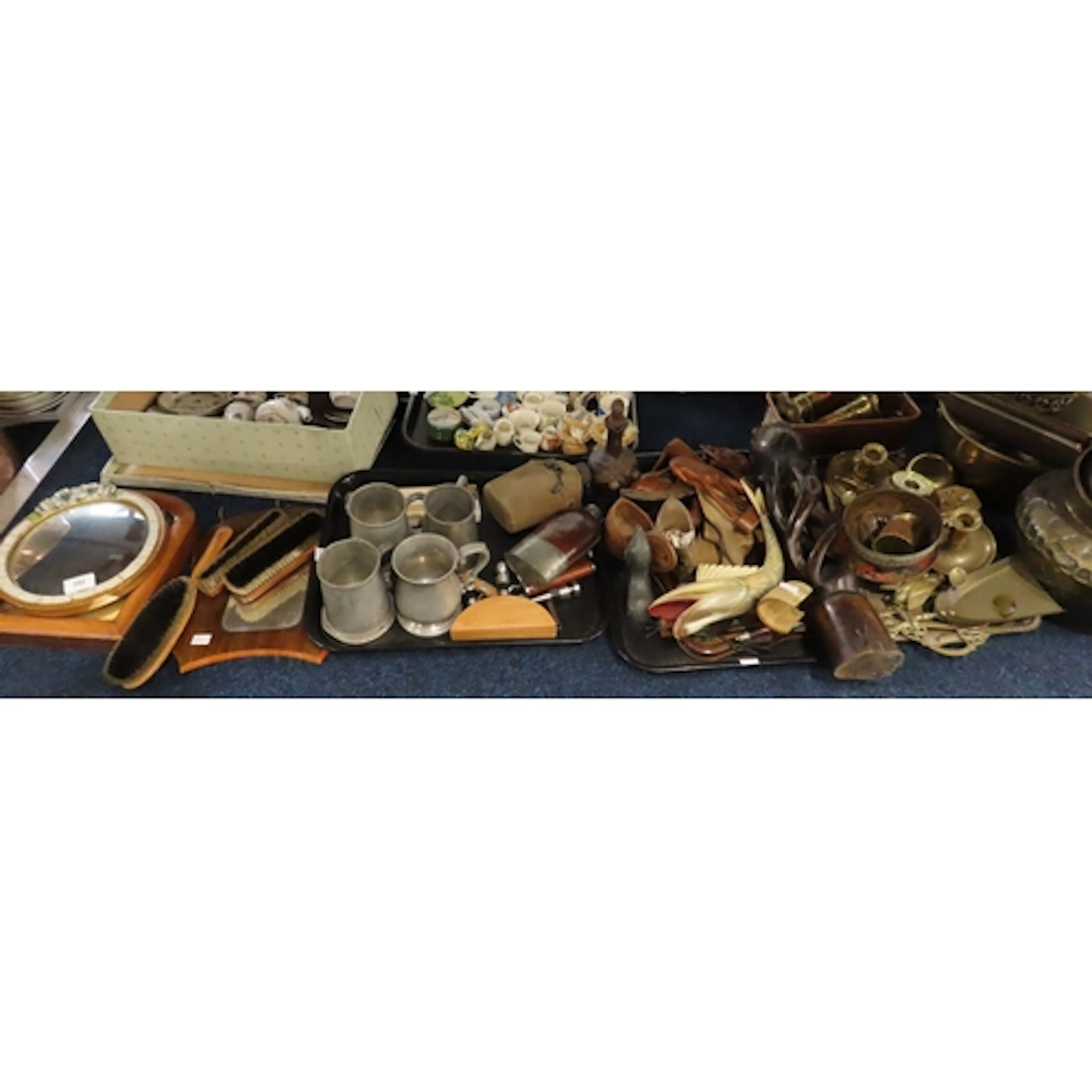 A collection of wood and metal items including Indian pots, ...