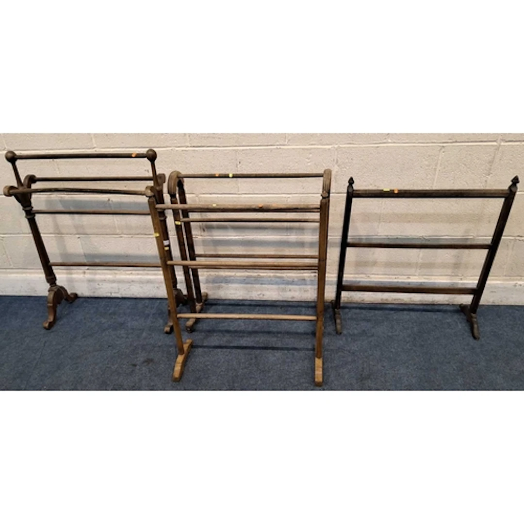 FOUR TOWEL RAILS, all varying in shape size, style, timber, ...