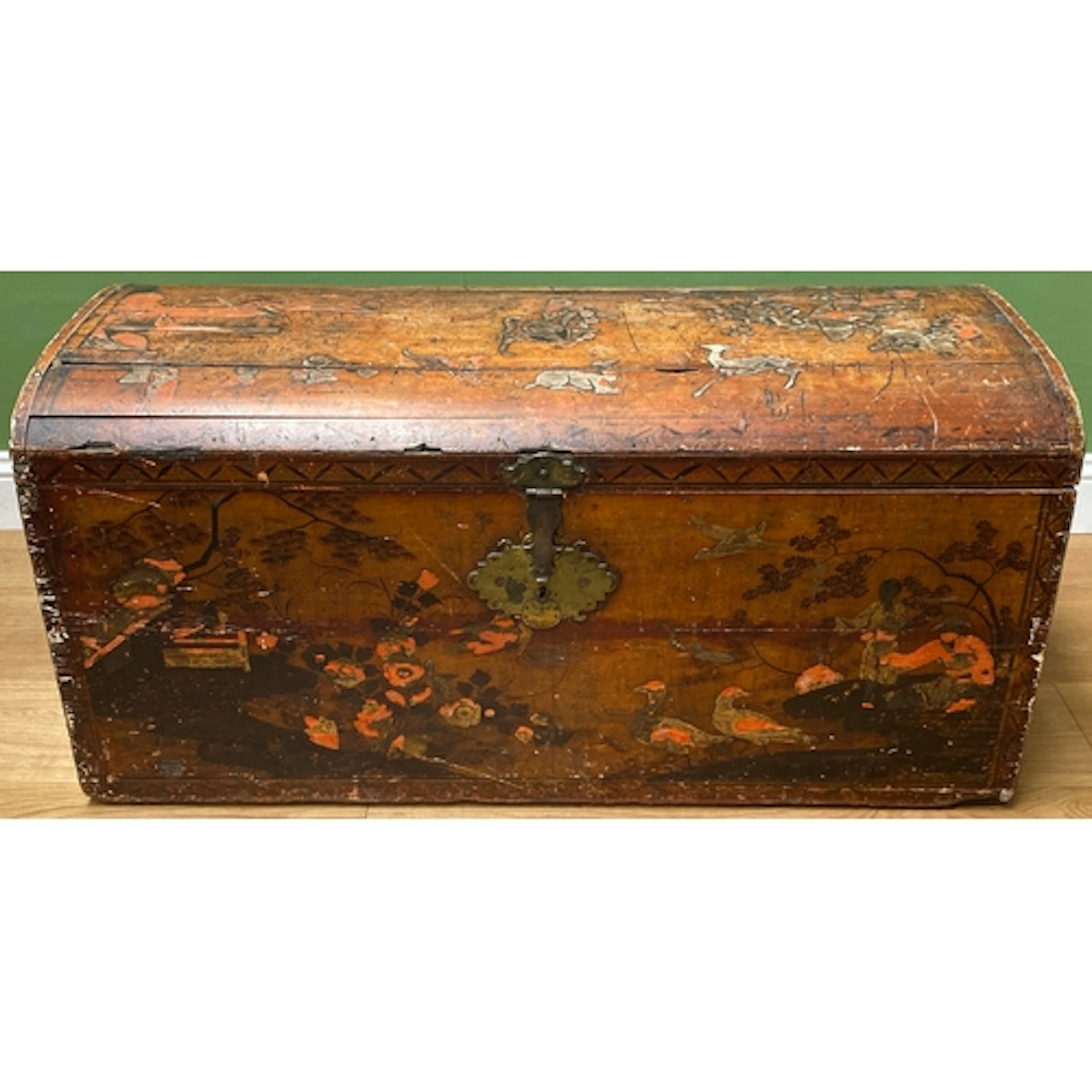 A Japanned domed trunk with twin brass carry handles, 118x54...