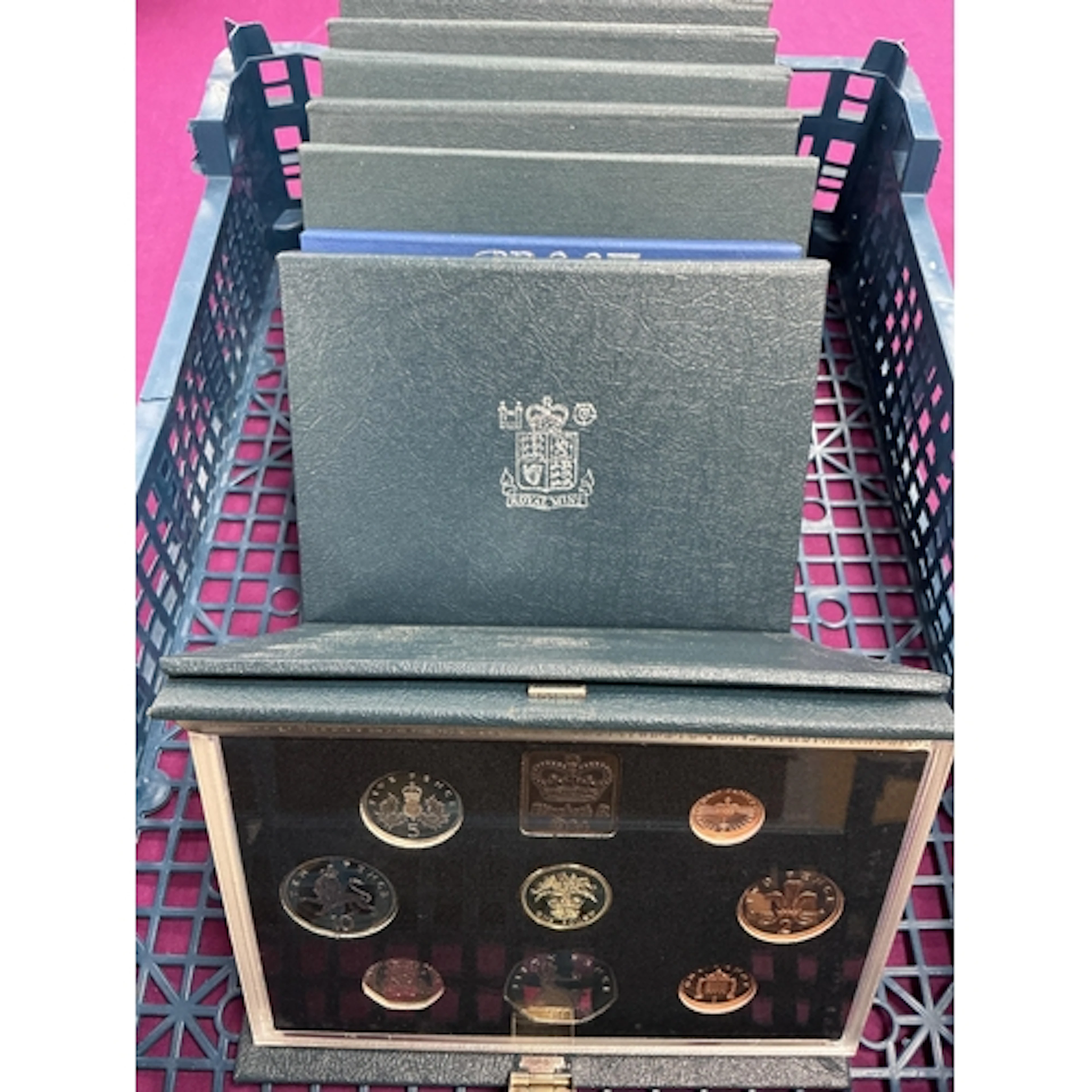 Eight Royal Mint Proof Annual Coin Sets, 1982 to 1989.