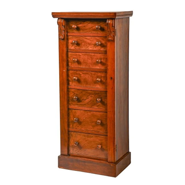 A Victorian walnut wellington chest, fitted with seven drawe...