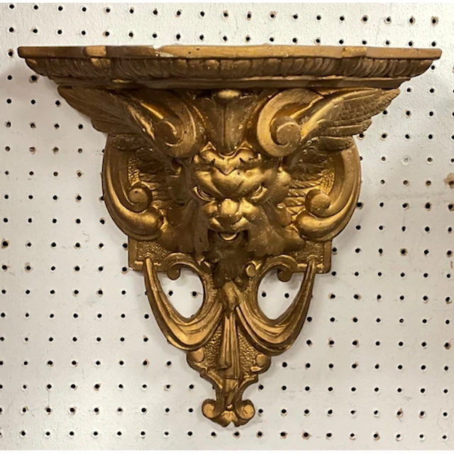 A 20th century rococo revival gilt wall shelf or corbel, pla...