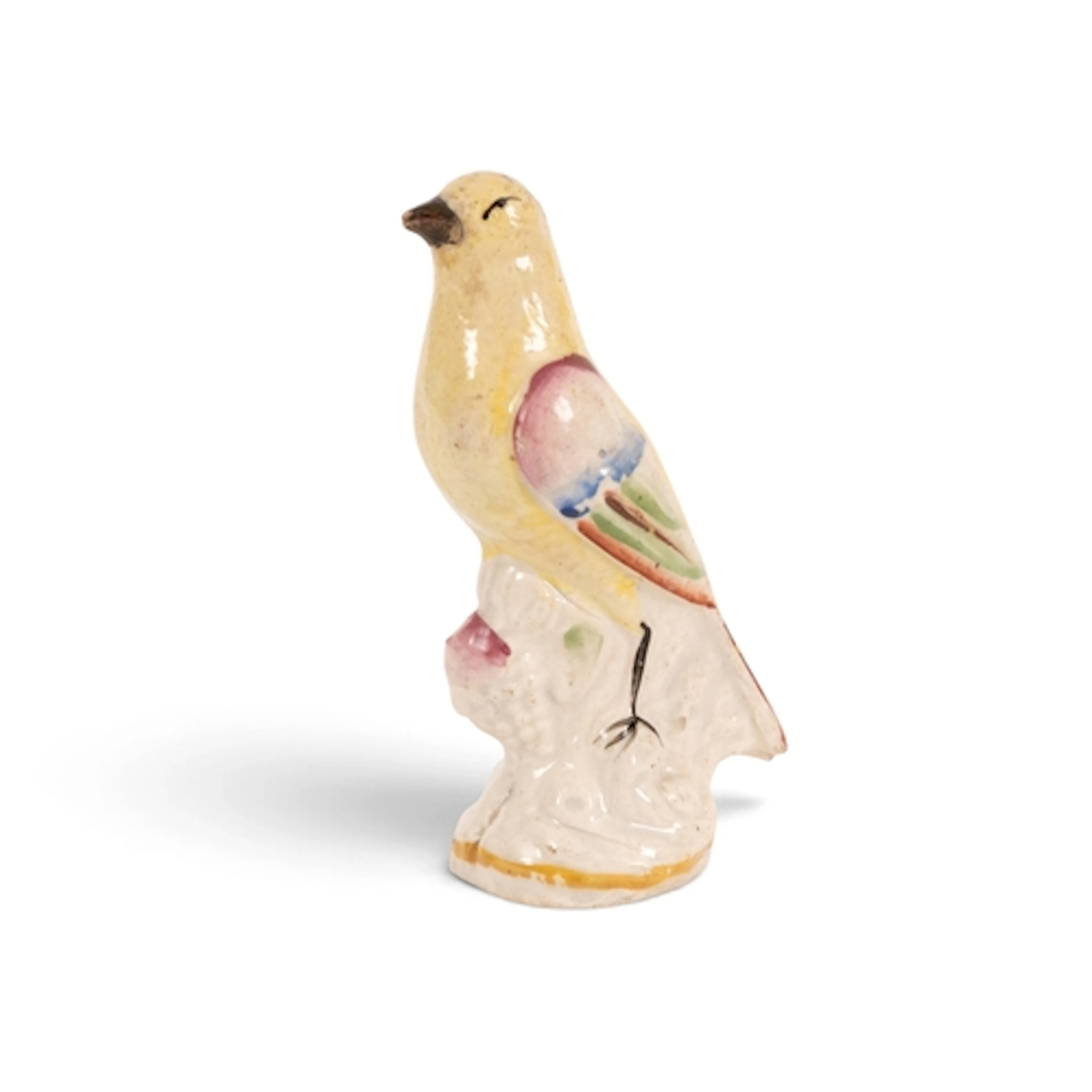 A Staffordshire figure of a canary, 1st half 19th century, ...
