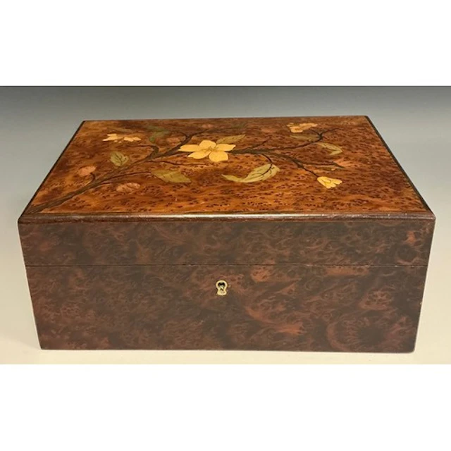 An Art Nouveau amboyna and marquetry rectangular jewellery b...