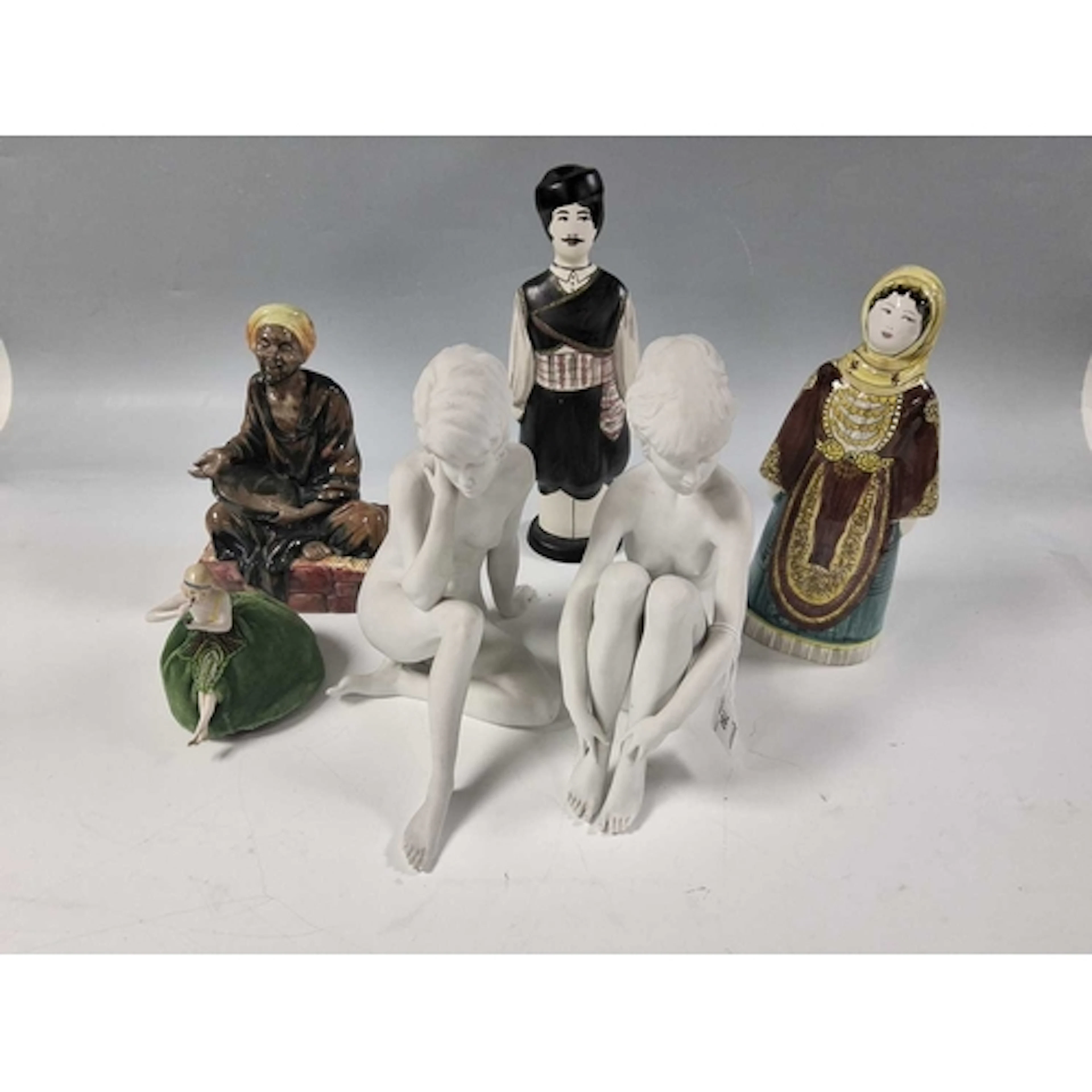 A GROUP OF VINTAGE CERAMIC FIGURINES comprising two highly d...