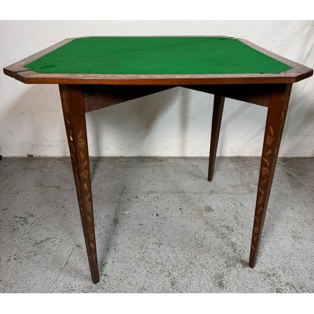 A Dutch marquetry card table with triangular folding top, gr...