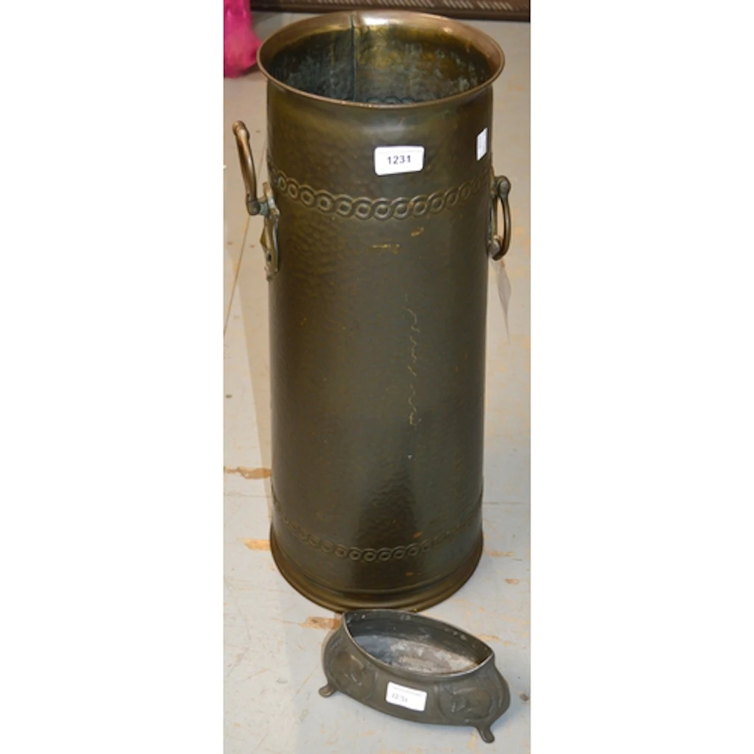 Continental Arts & Crafts brass cylindrical stick stand, tog...
