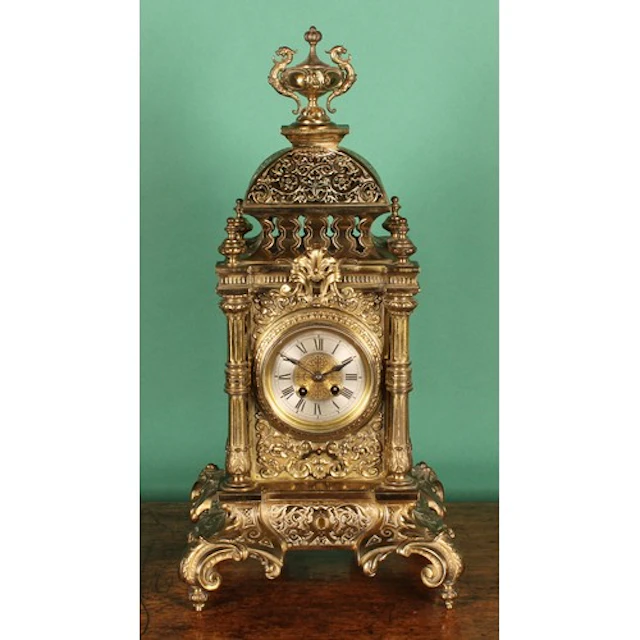 A 19th century Louis XIV Revival brass table or bracket cloc...
