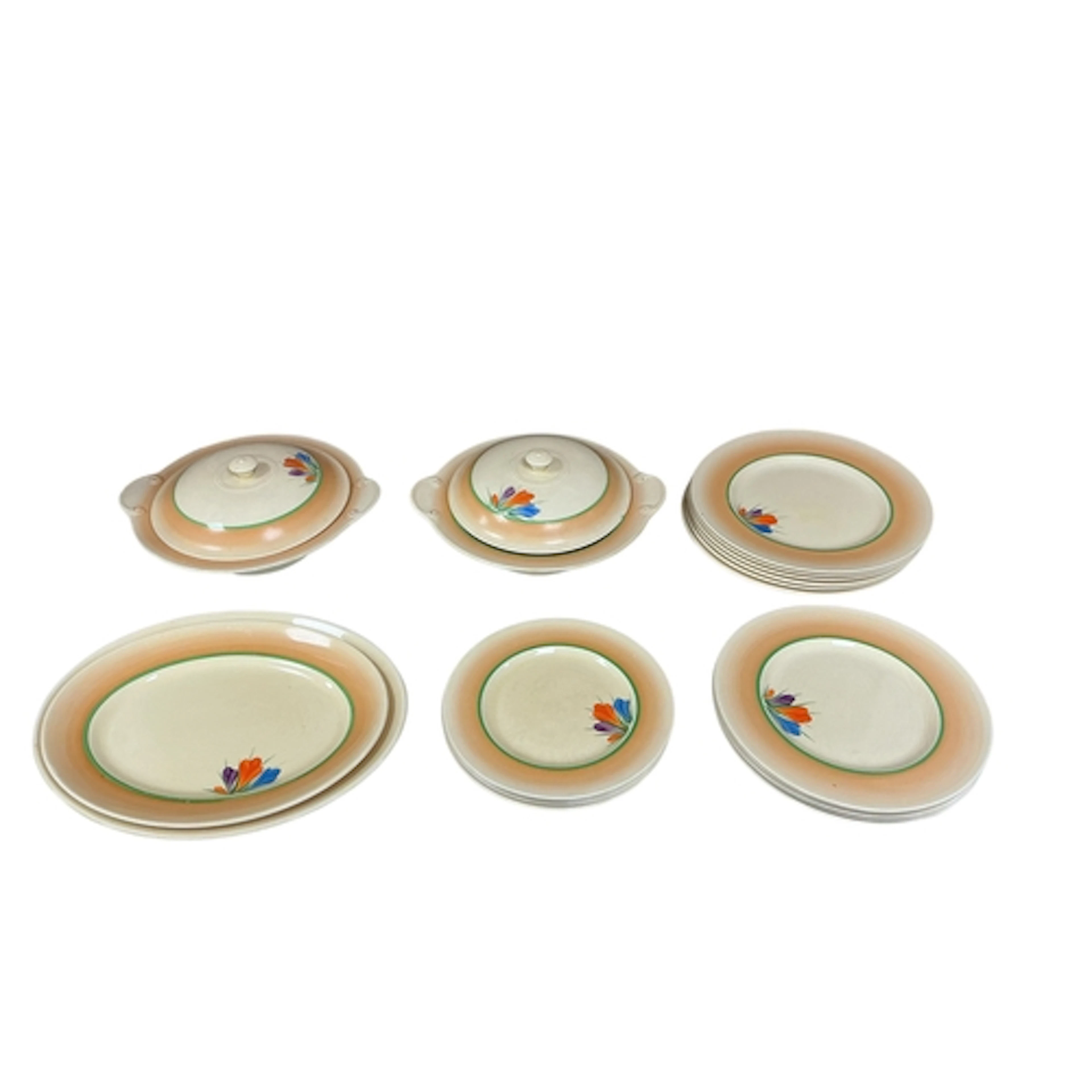 A Newport pottery Clarice Cliff crocus pattern part dinner s...