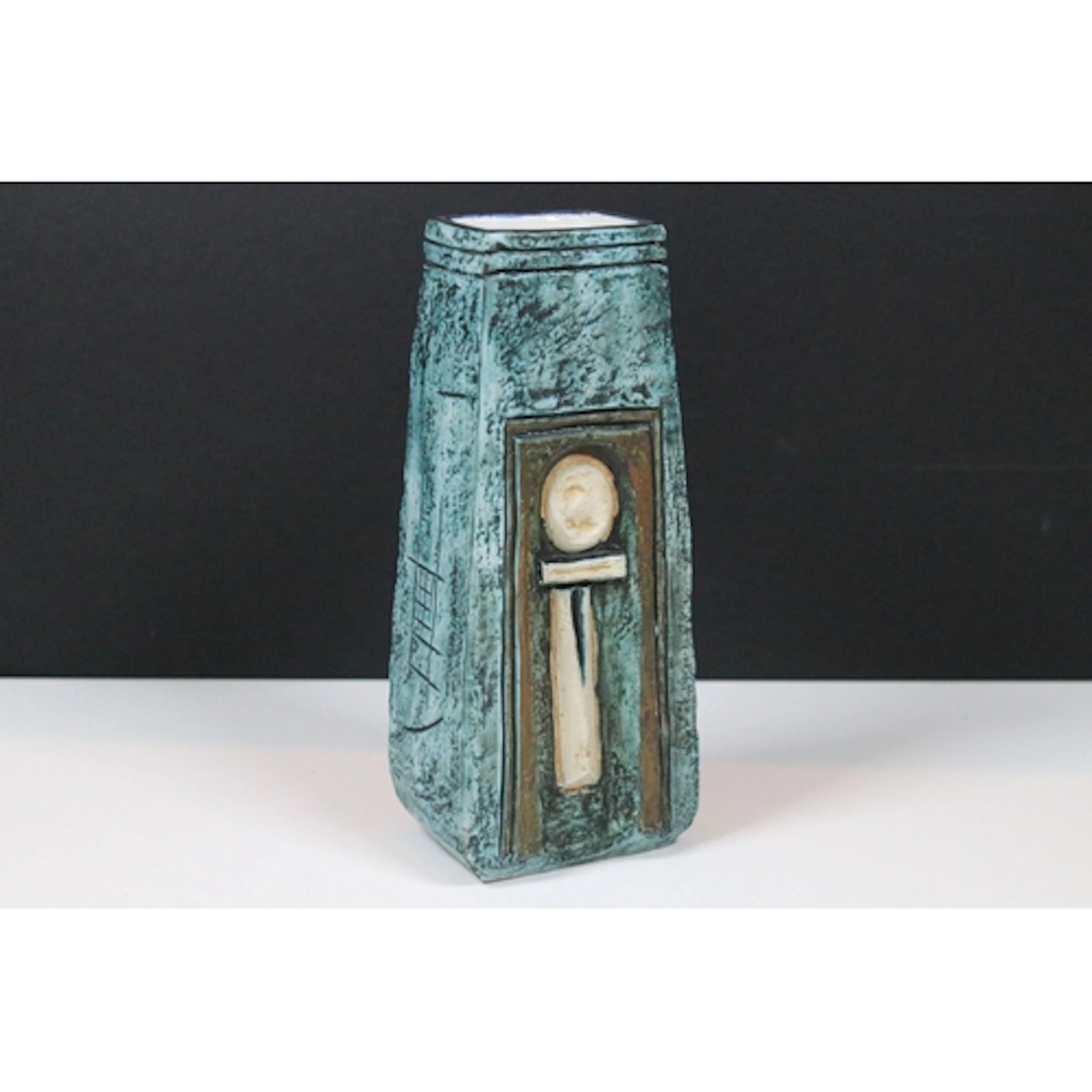 Troika pottery coffin vase, by Penny Black, having blue grou...