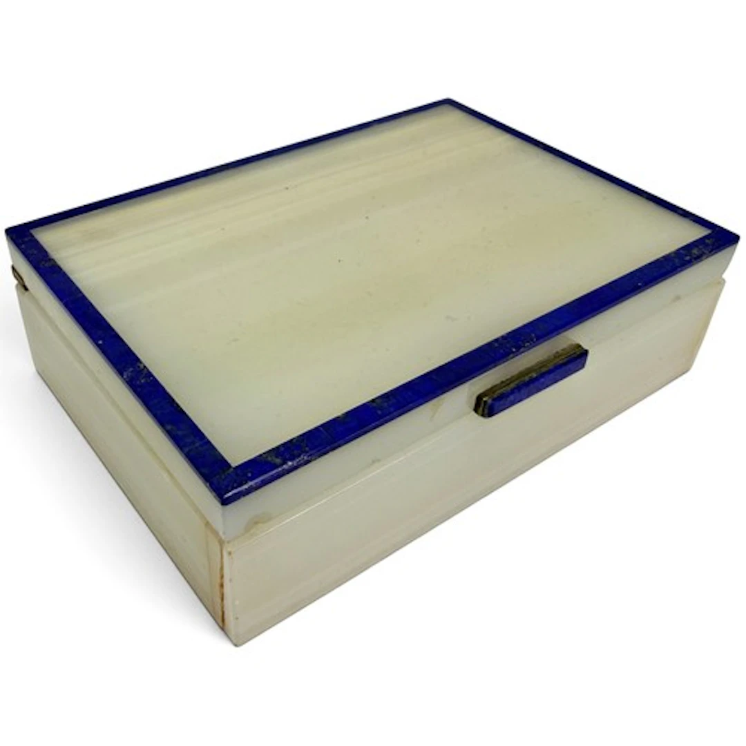 An Art Deco white agate box, banded with lapis lazuli, with ...