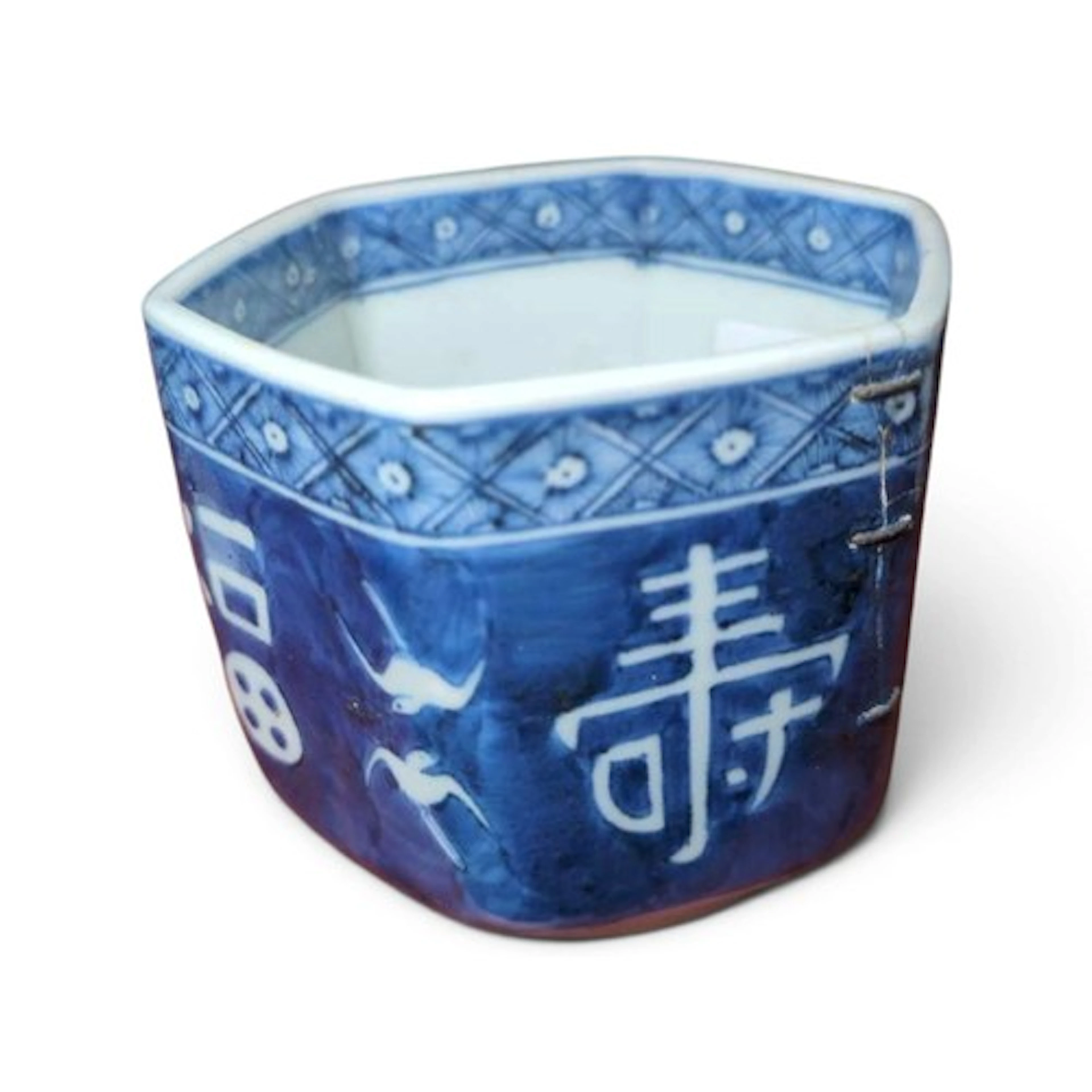 Japanese underglaze blue & white porcelain faceted vesse...