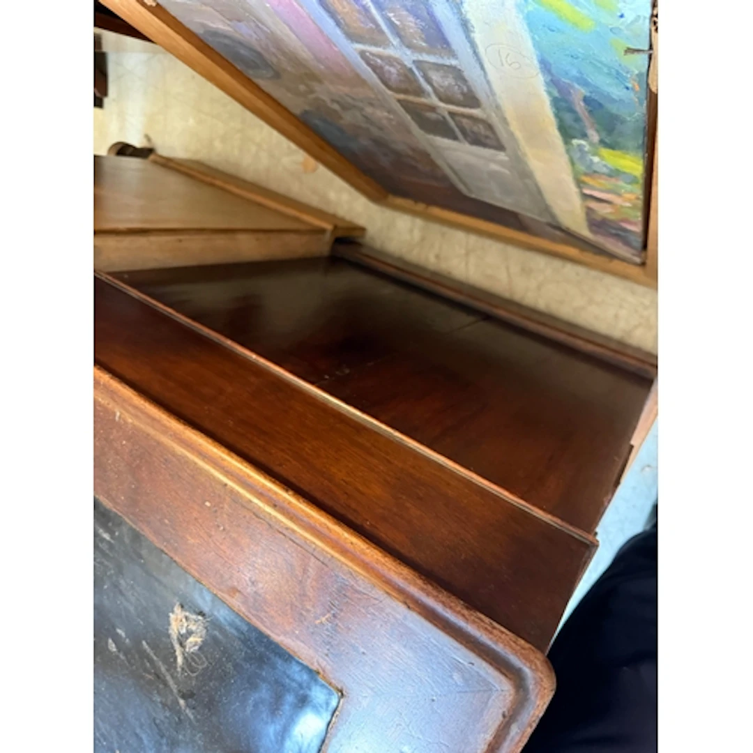 AN EDWARDIAN WALNUT PEDESTAL DESK Together with a nest of ma...