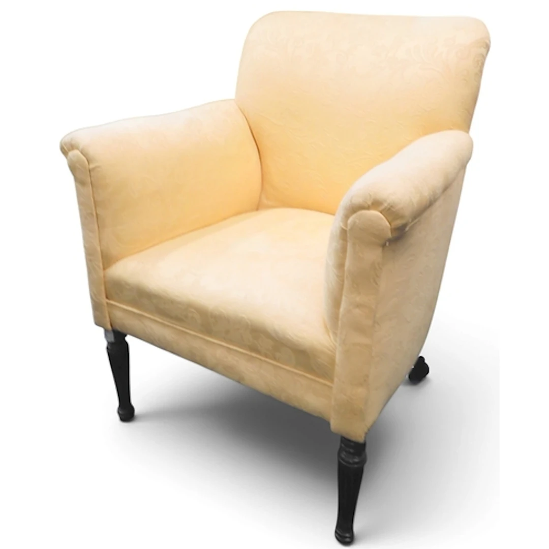 A late 19th century armchair with yellow foliate pattern uph...