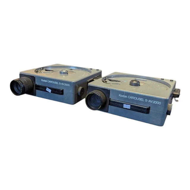 Two vintage 20th century Kodak S-AV2000 carousel slide proje...