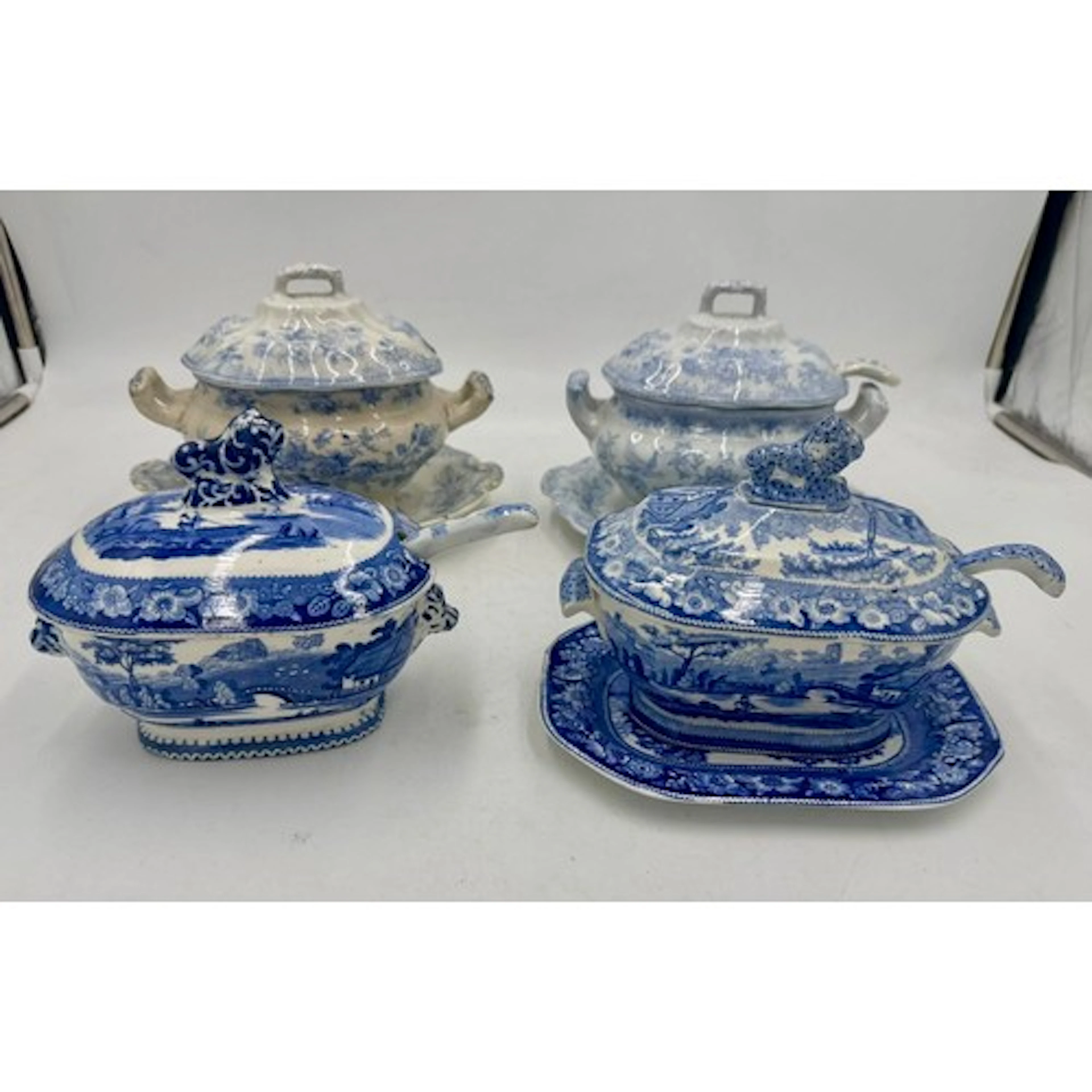 Four early 19th century blue and white transfer-printed sauc...