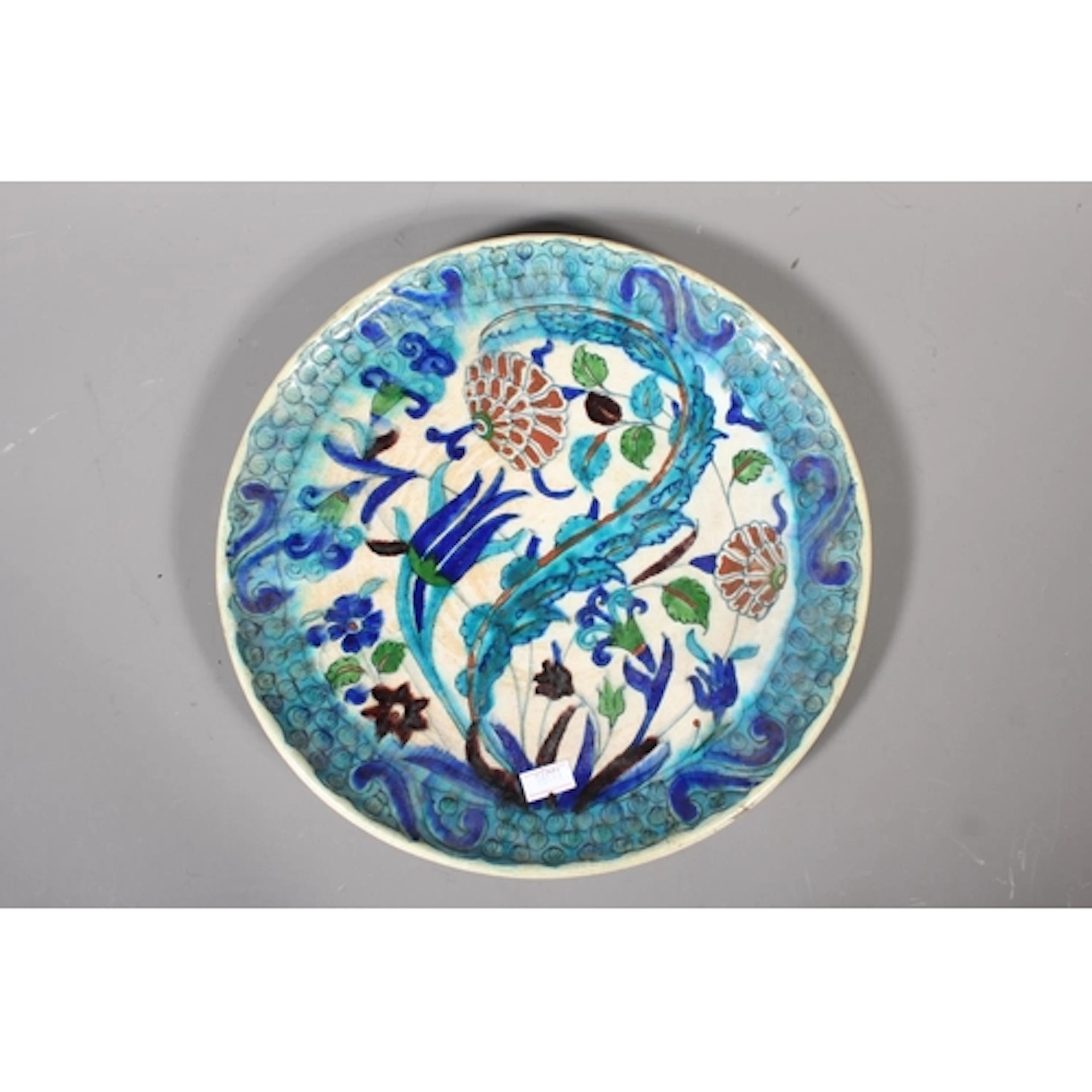 Iznik plate with floral decoration, blue glazed, 28cm diamet...