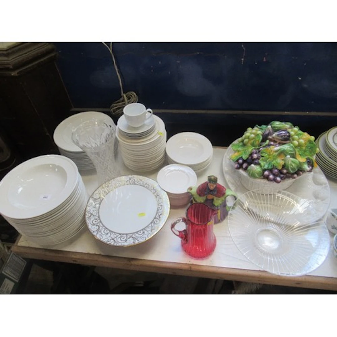 A collection of porcelain, glass, fruit centrepiece