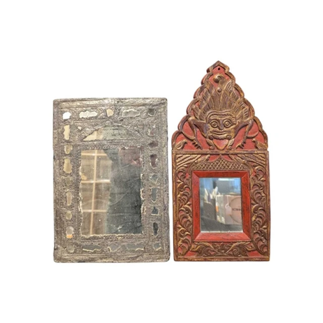 A 19th century Persian silver cased hanging panel mirror. Th...