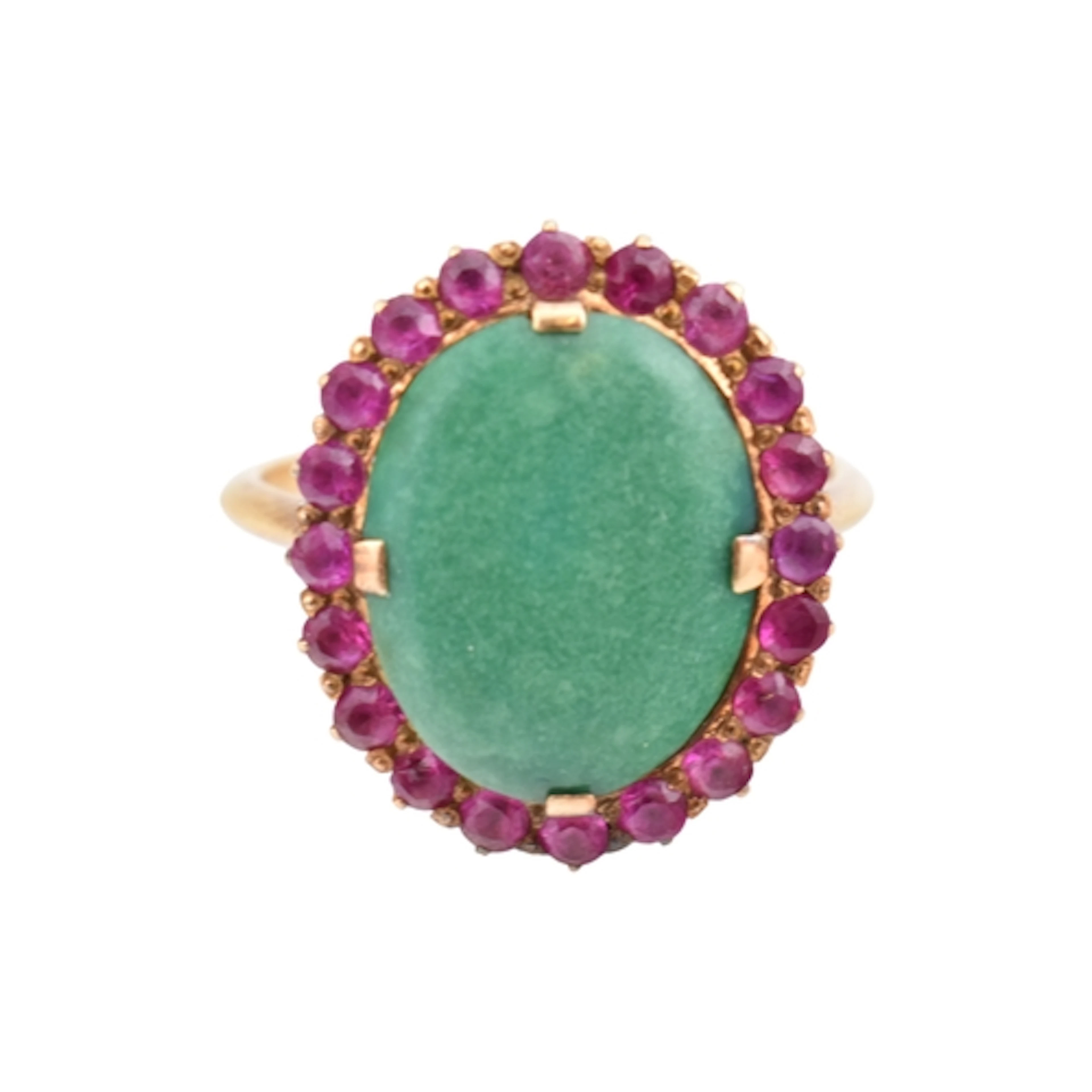 A gold and gem set halo ring. The ring set with a blue-green...