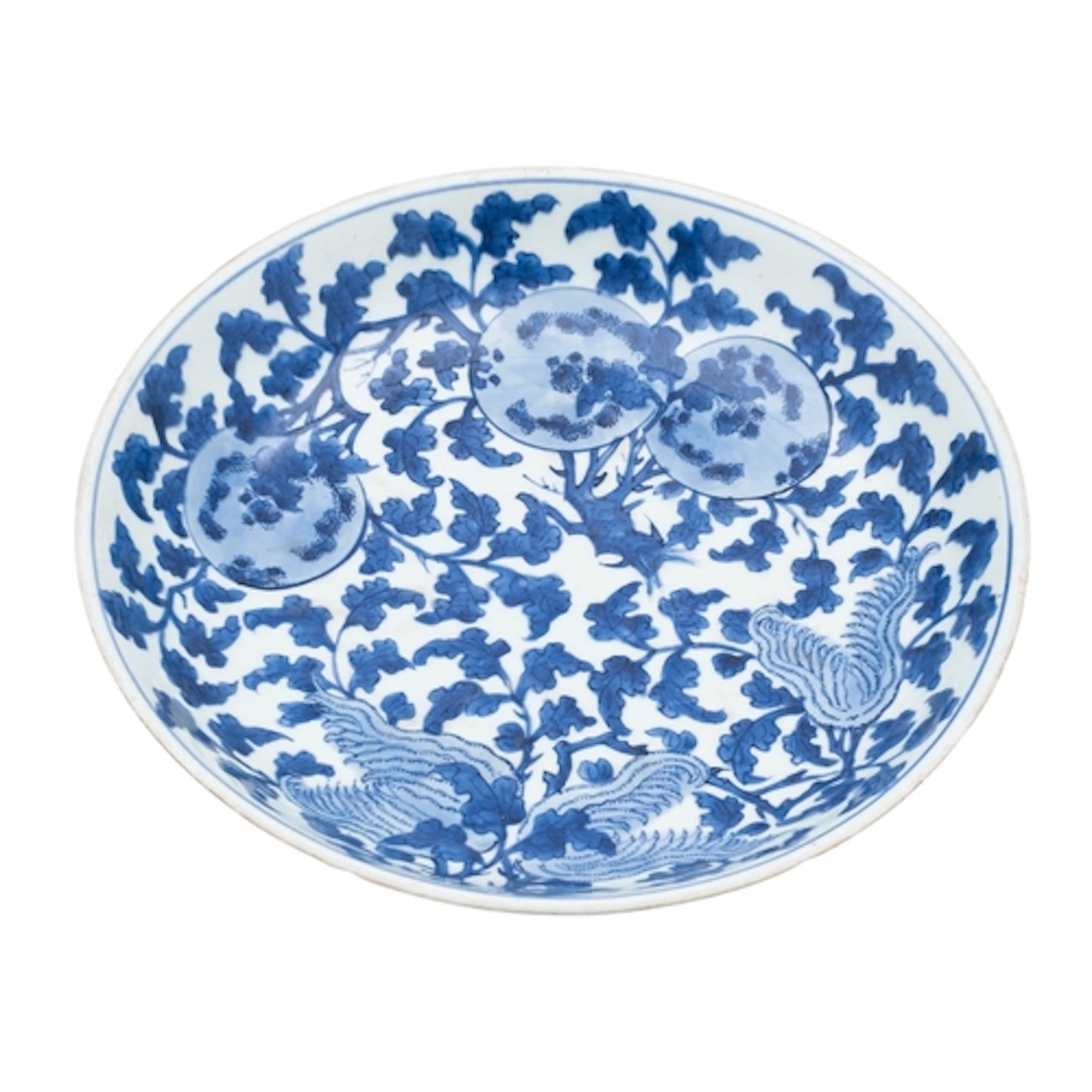 A Chinese blue and white charger, Kangxi painted with pomegr...