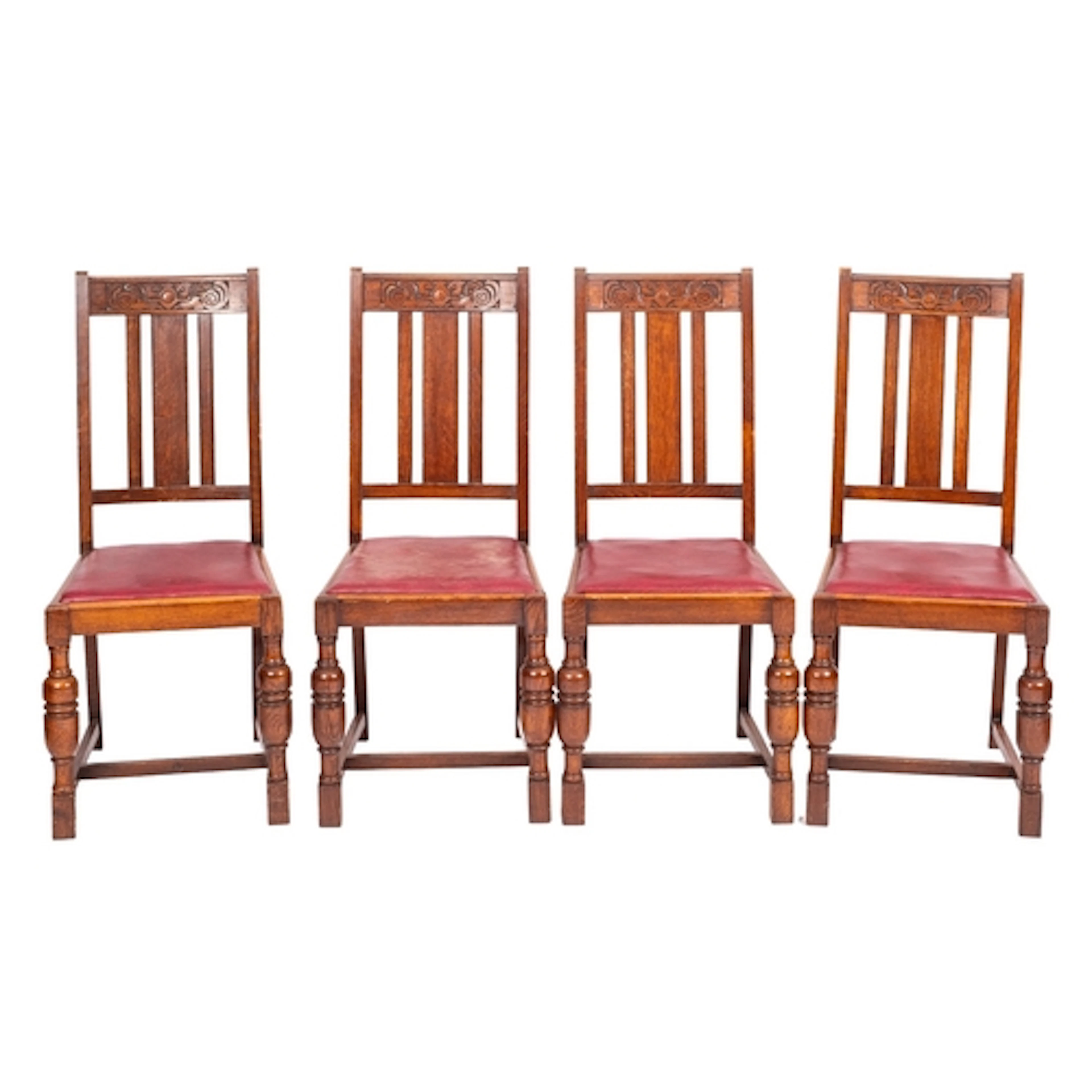 A set of four oak chairs in late 17th century taste, early 2...