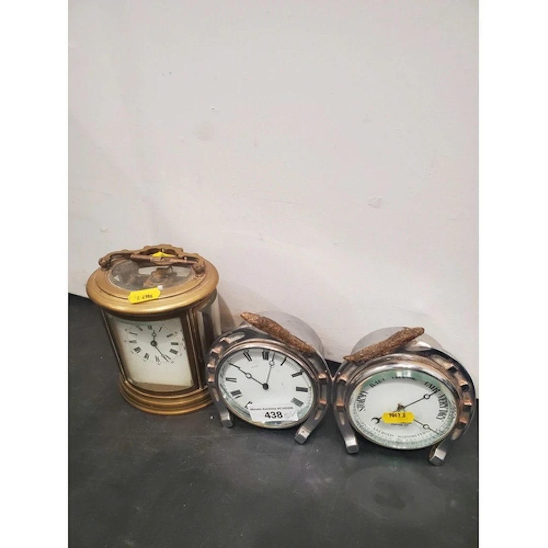 A Mappin & Webb Clock and Barometer in plated horseshoe fram...