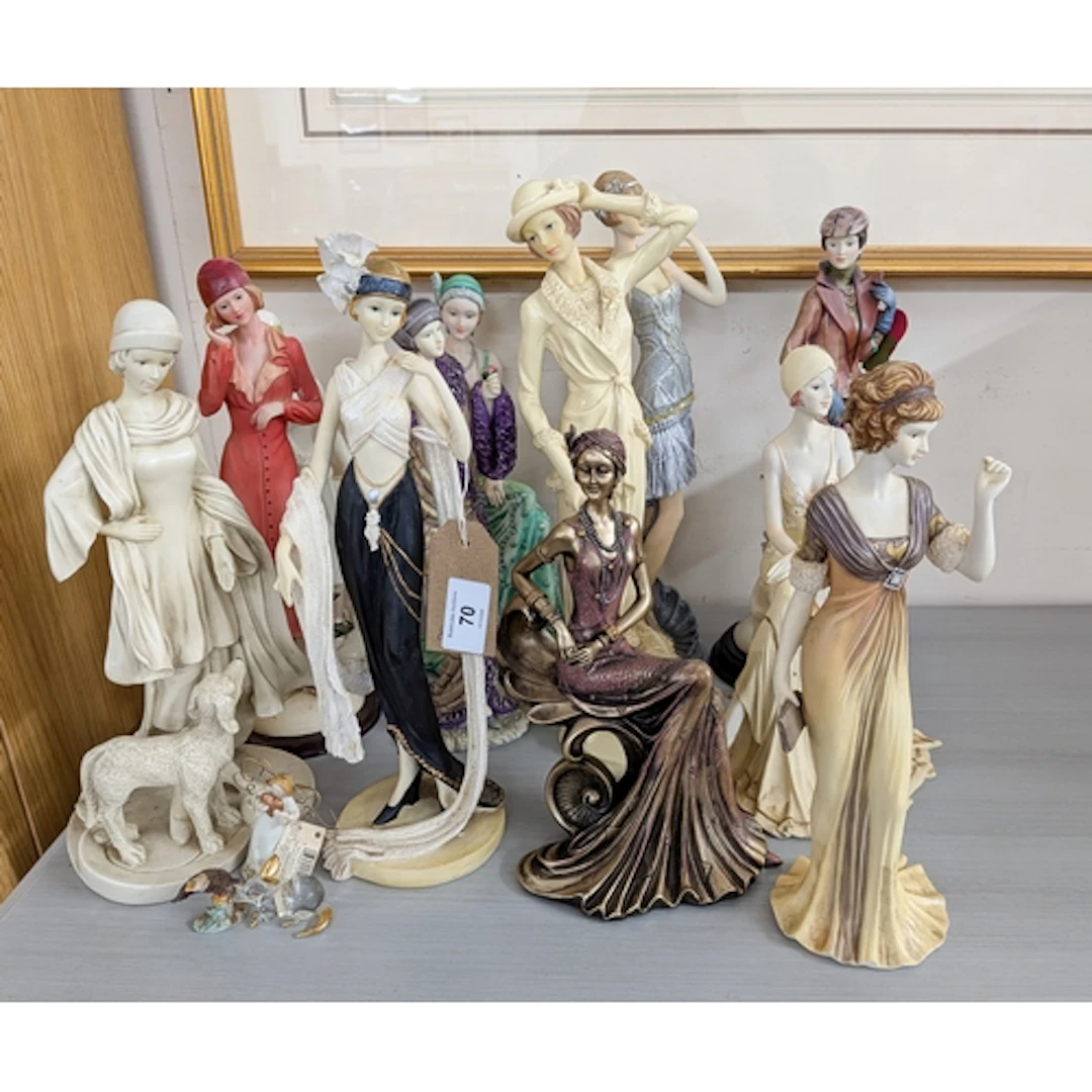 A collection of Art Deco style lady figurines