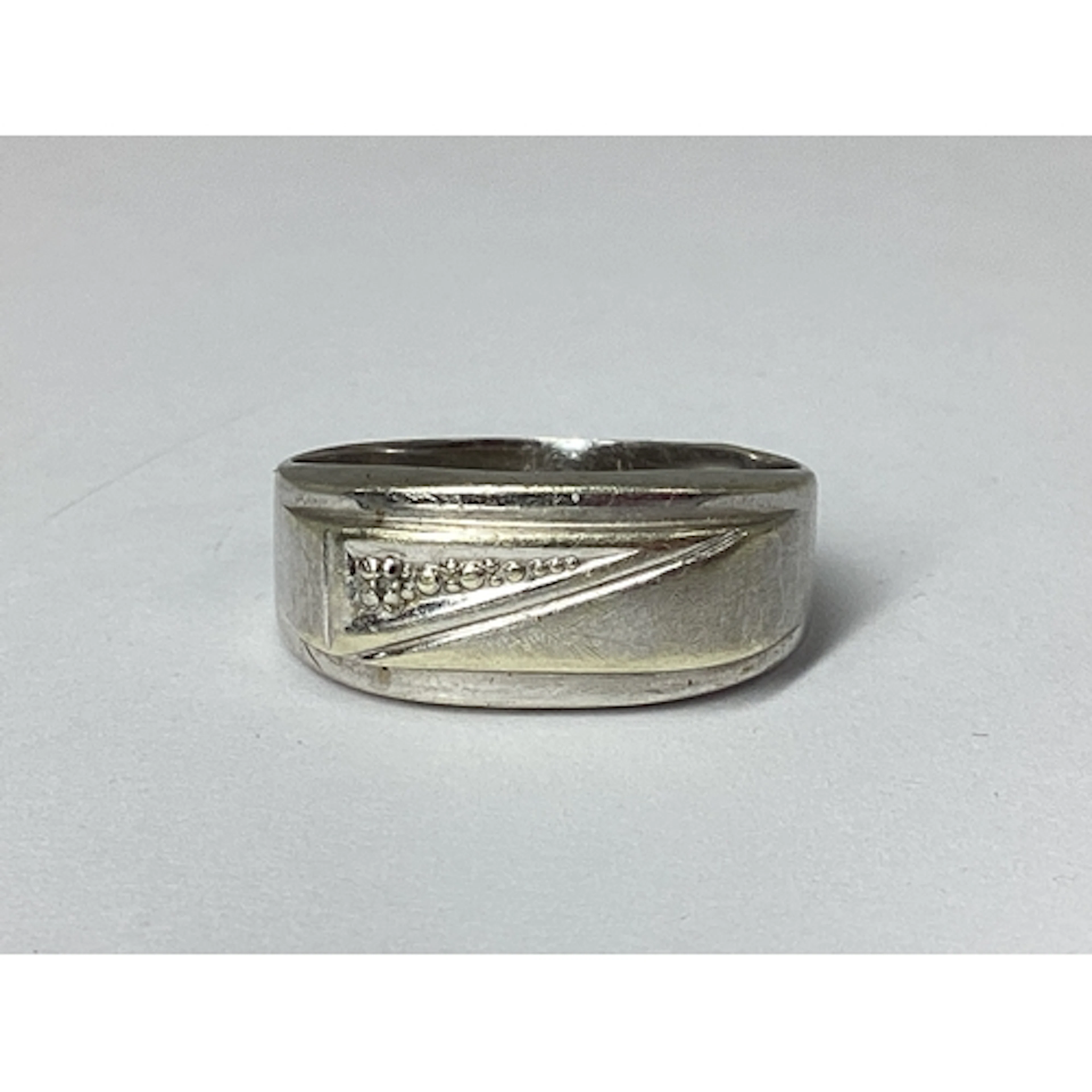 A Modern 9ct White Gold Panel Style Ring, of textured design...
