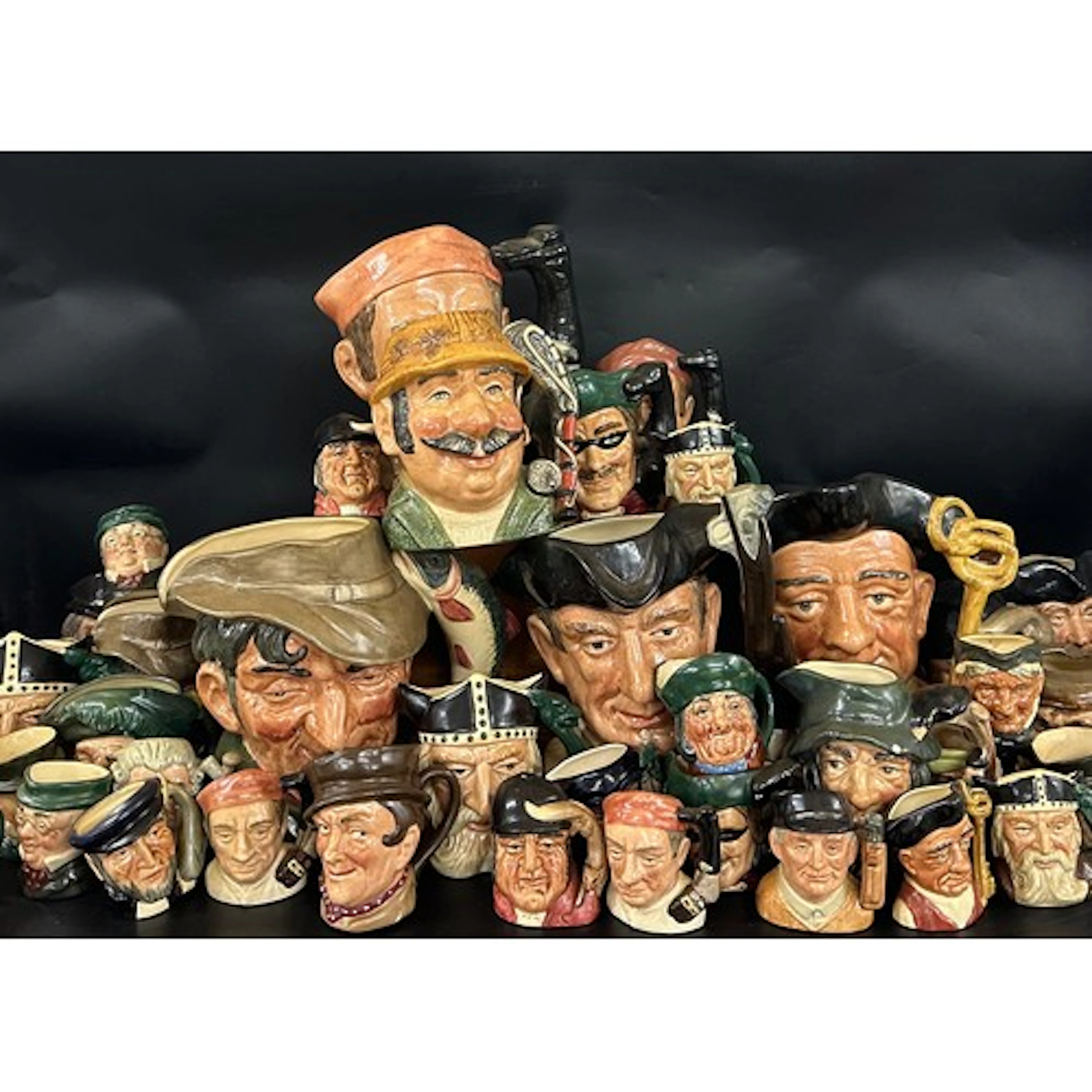 Two boxes of Royal Doulton character jugs of varying sizes i...