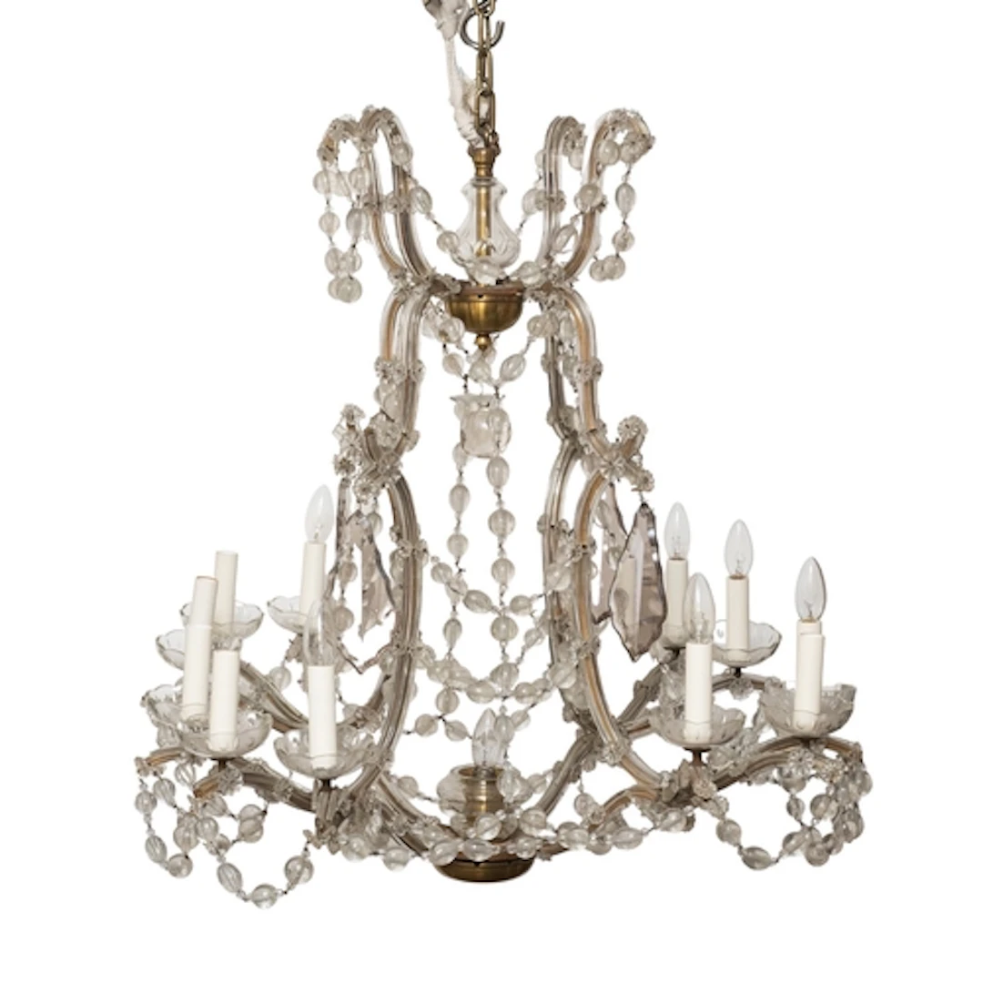A gilt metal and moulded glass twelve light chandelier, seco...