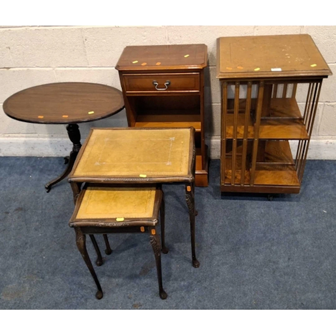 AN EARLY 20TH CENTURY REVOLVING BOOKCASE, a small open bookc...