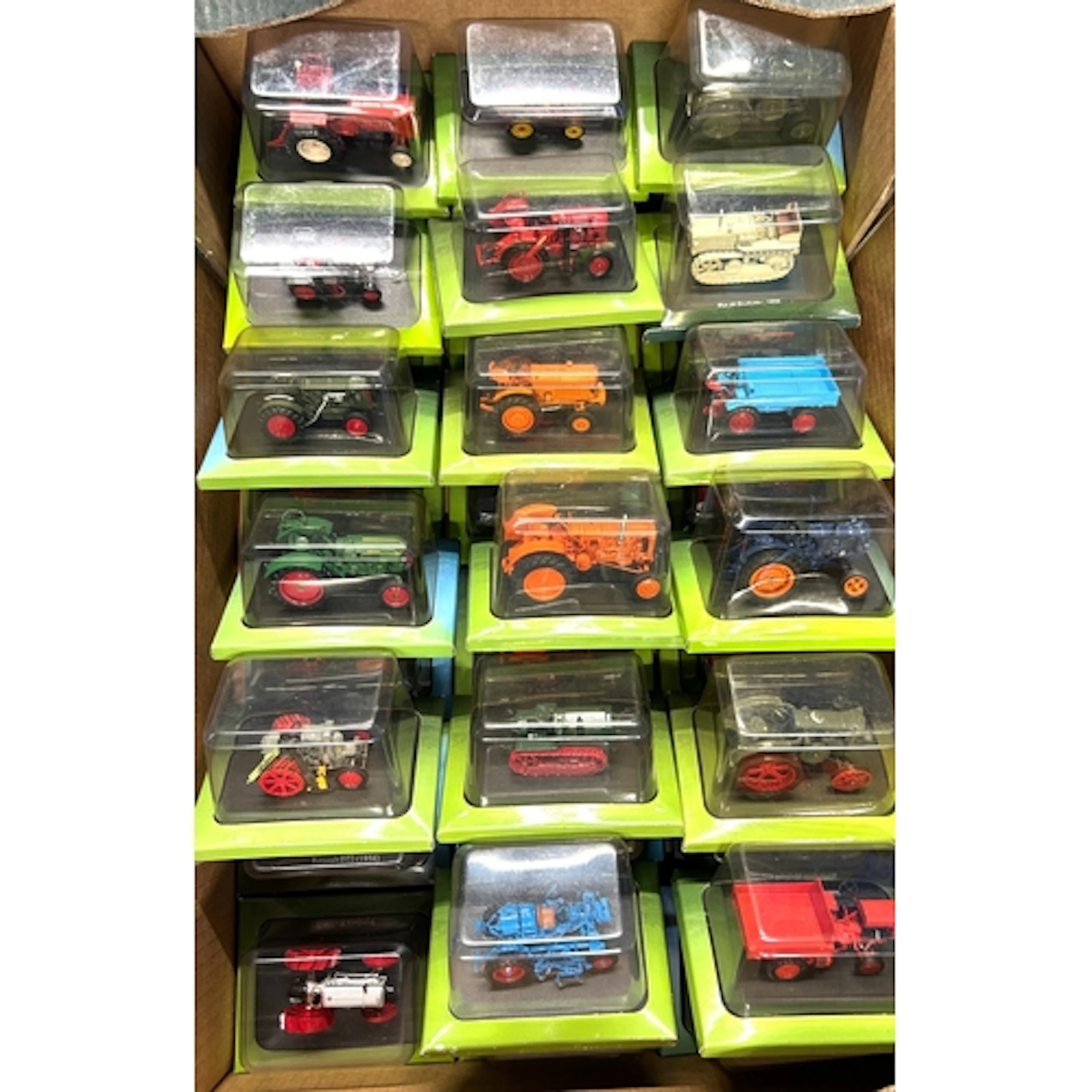 A collection of magazine issue model tractors, by Hachette P...