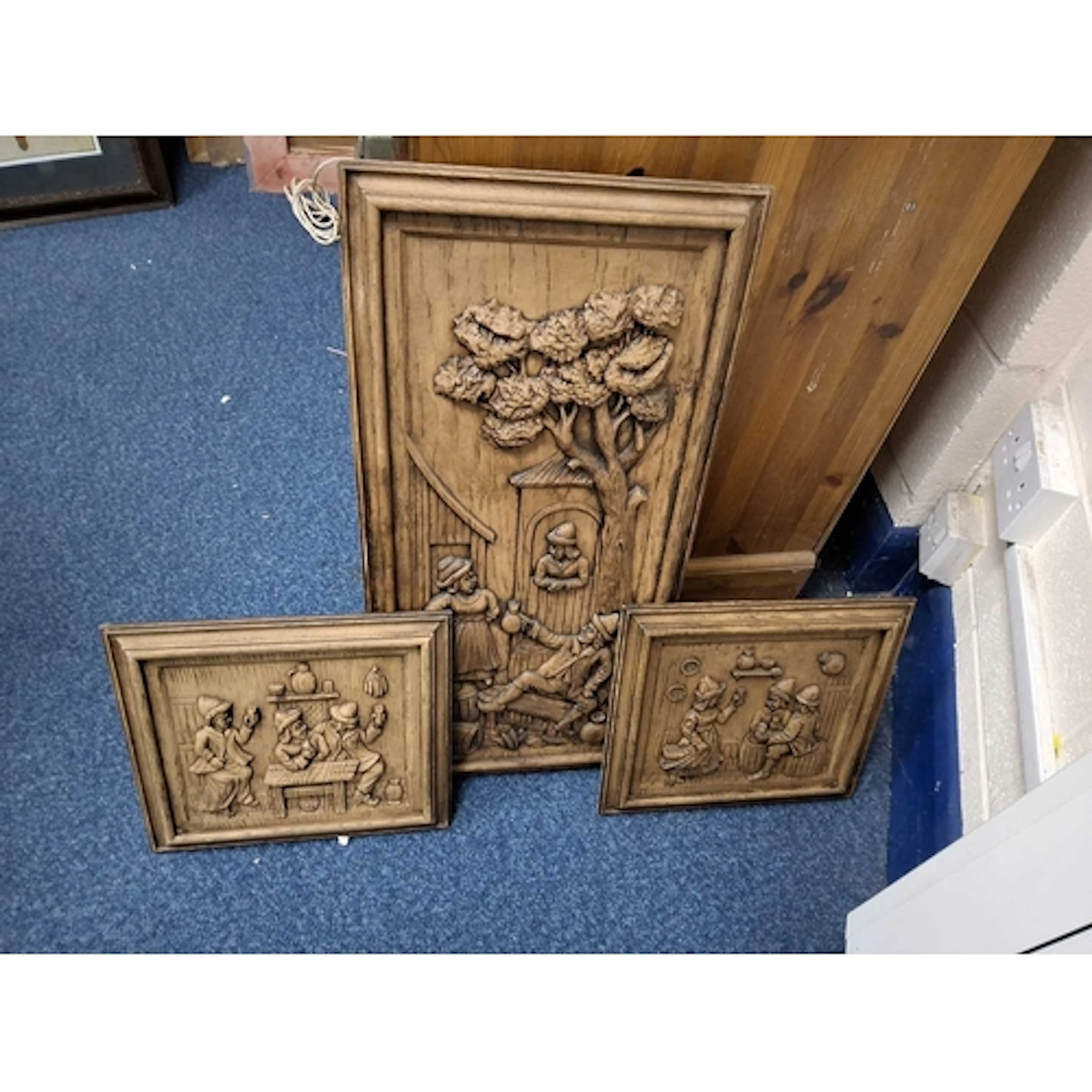 THREE CARVED OAK RELIEF PANELS OF TAVERN AND FOLK SCENES, ca...
