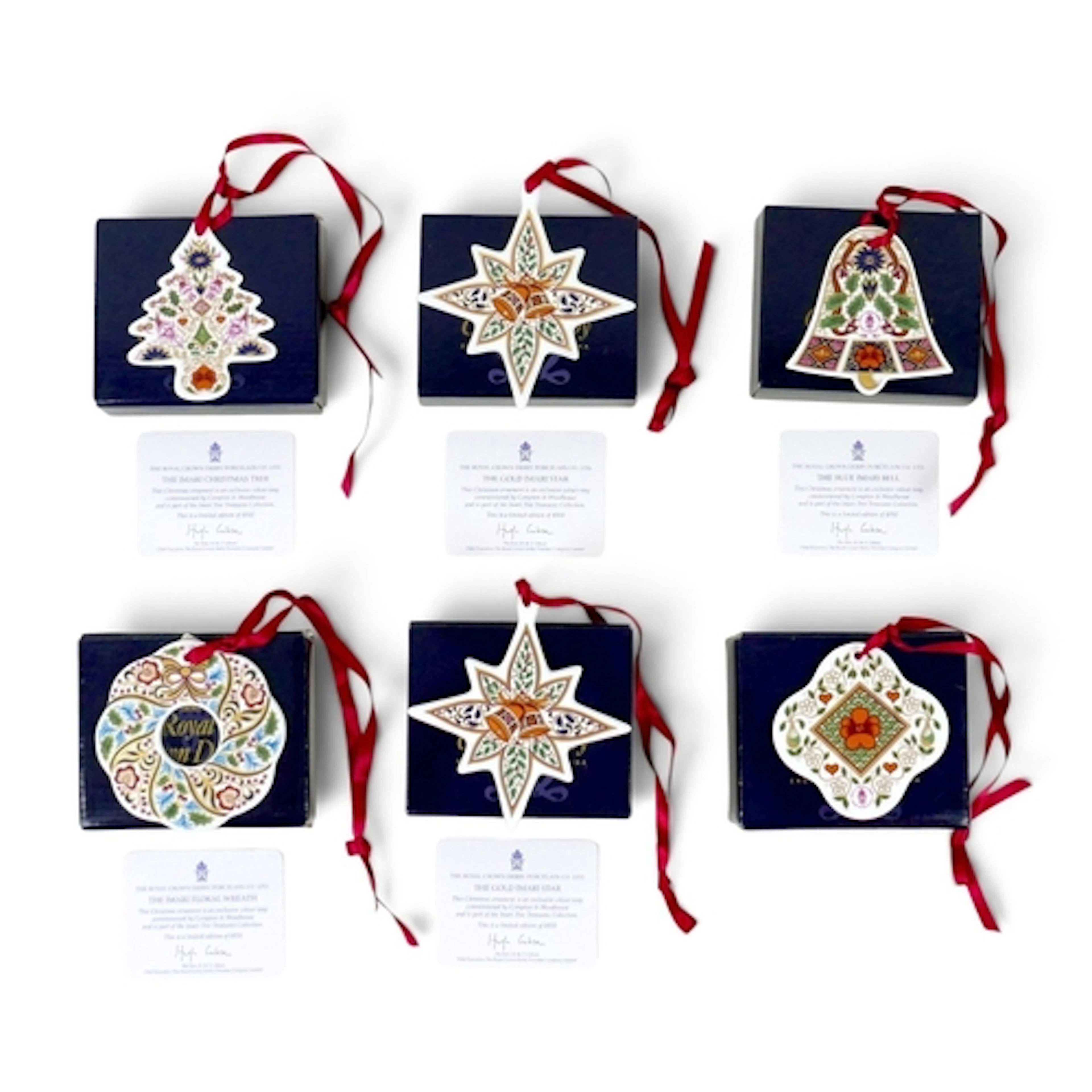 SIX ROYAL CROWN DERBY CHRISTMAS DECORATIONS. comprising five...