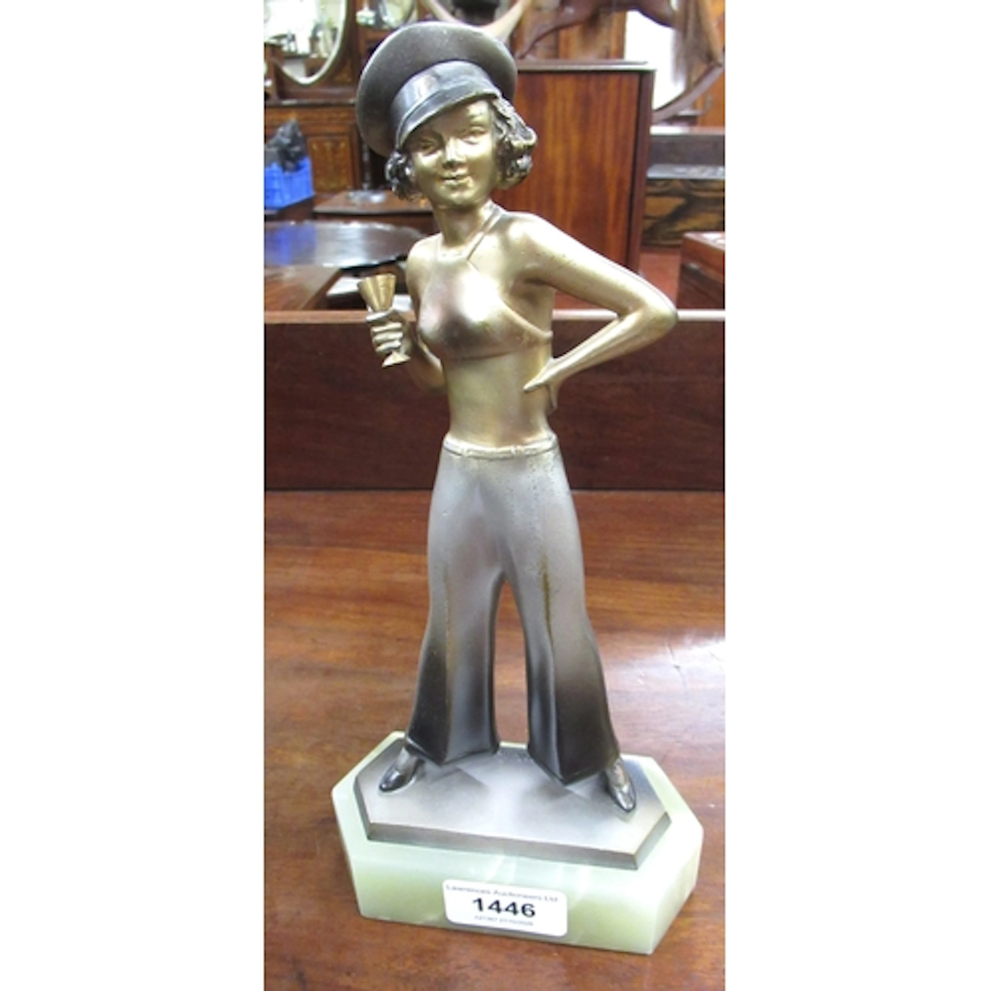 Josef Lorenzl, a gilded and silvered bronze figure of a stan...