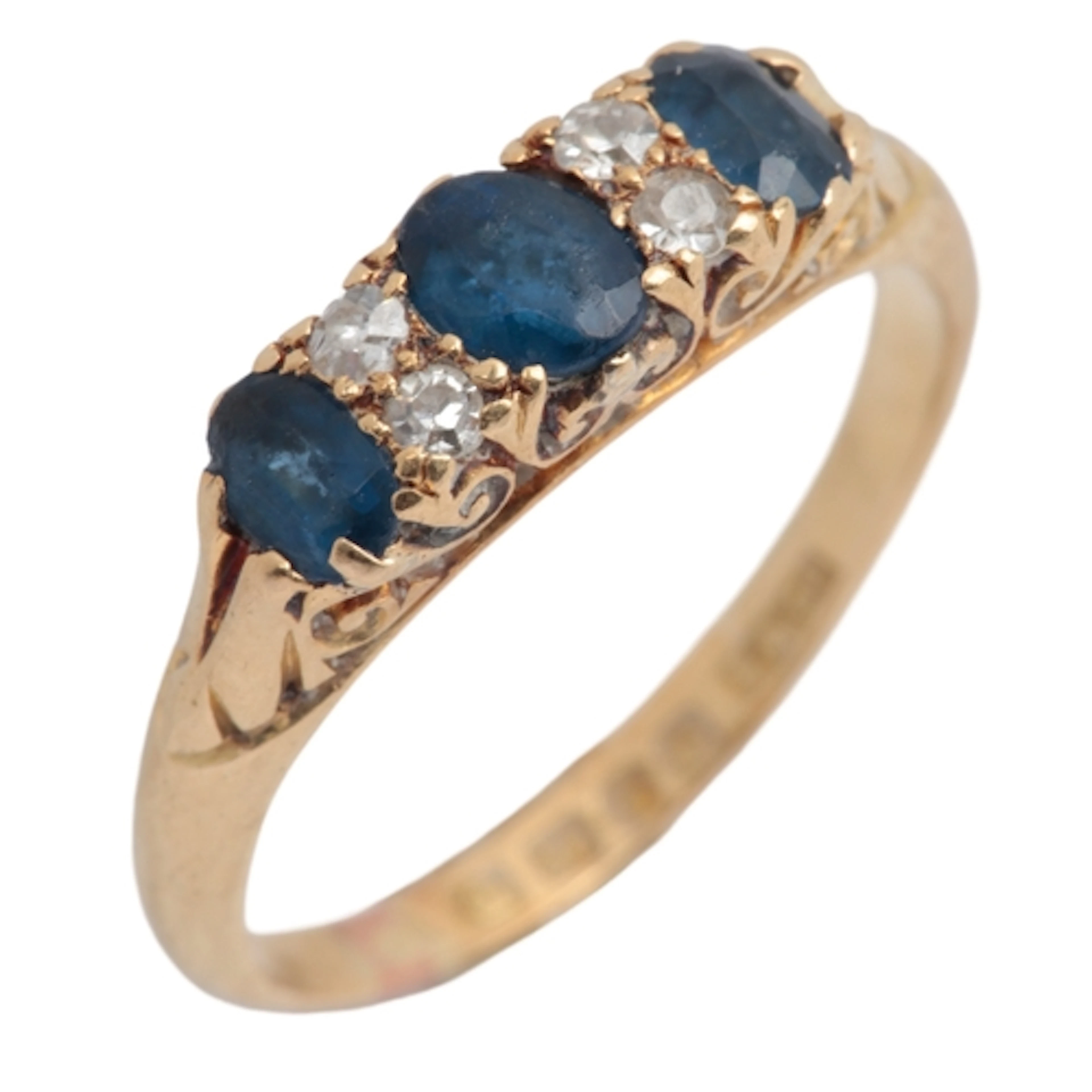 A sapphire and diamond ring, circa 1915, claw-set with three...