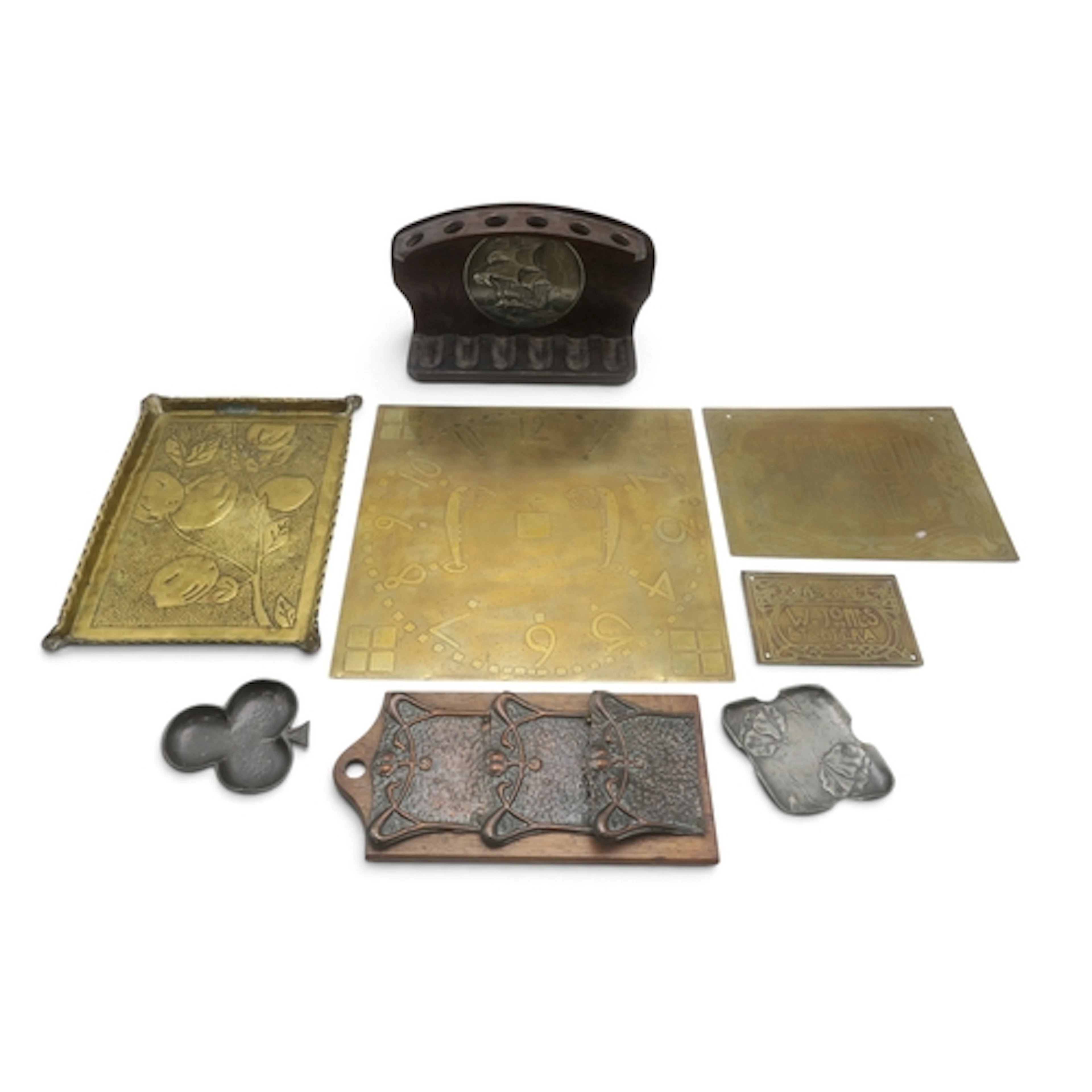 AN ARTS AND CRAFTS BRASS TRAY of rectangular form decorated ...