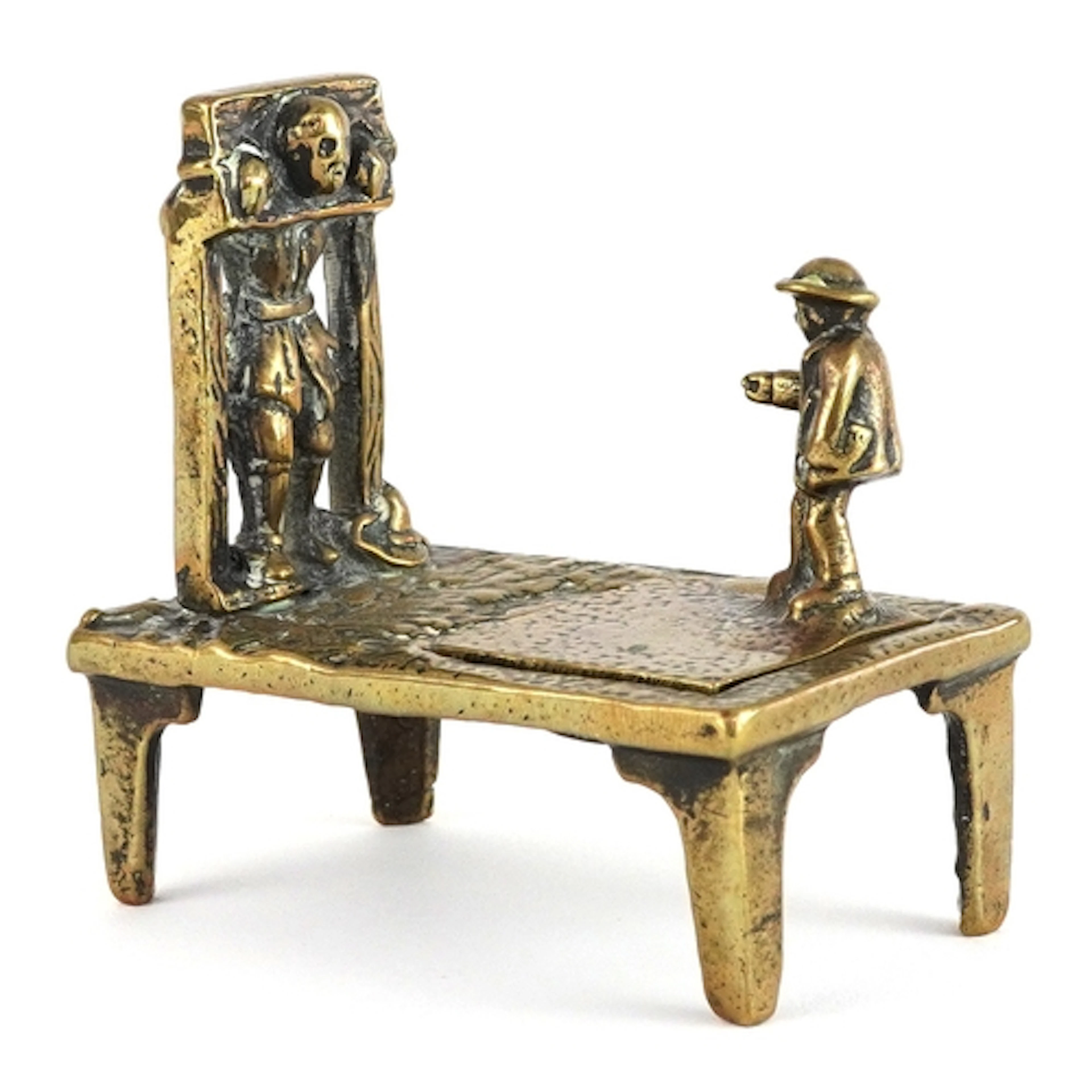 Victorian novelty inkwell in the form of a figure in stocks,...