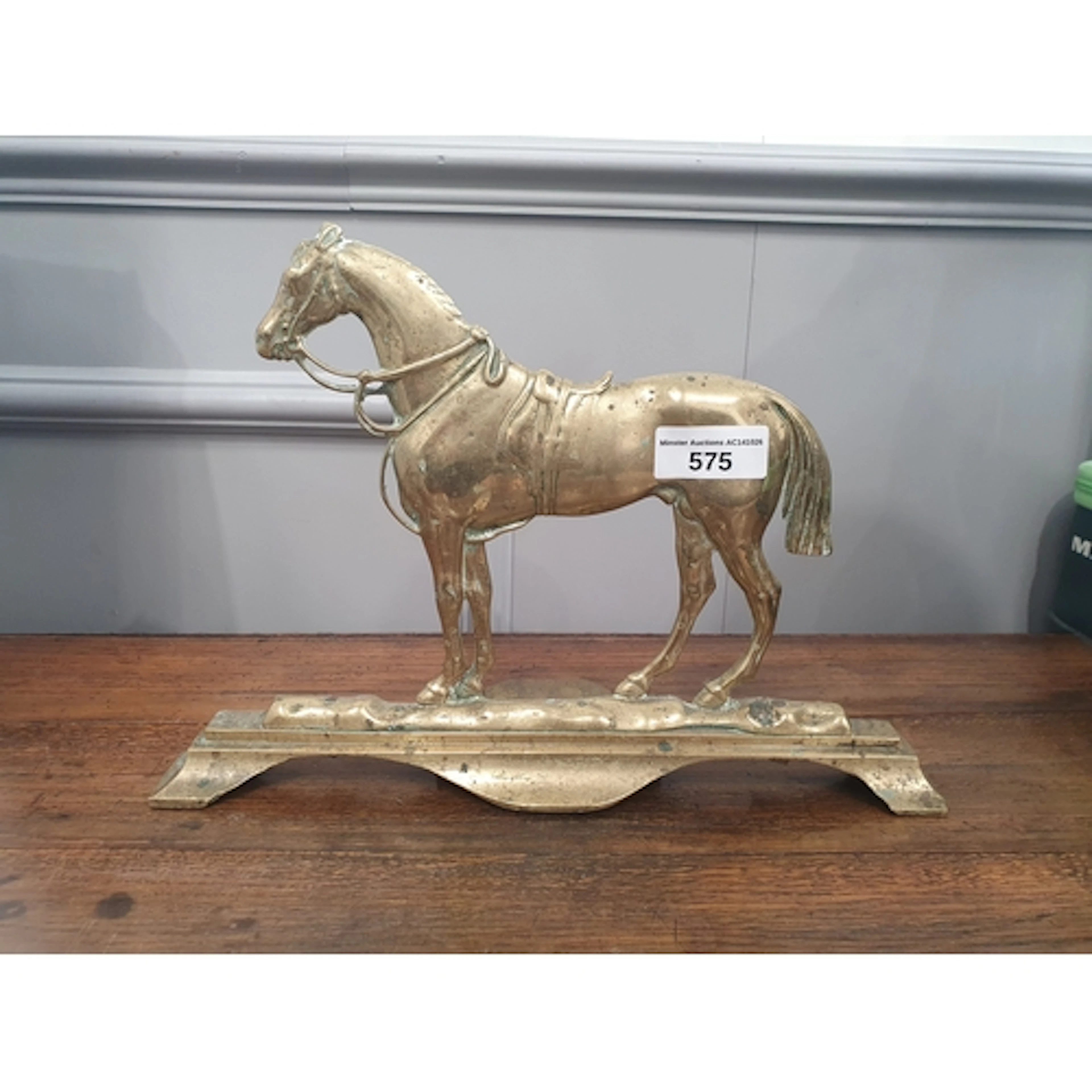 A brass Doorstop in the form of a horse, (R3).