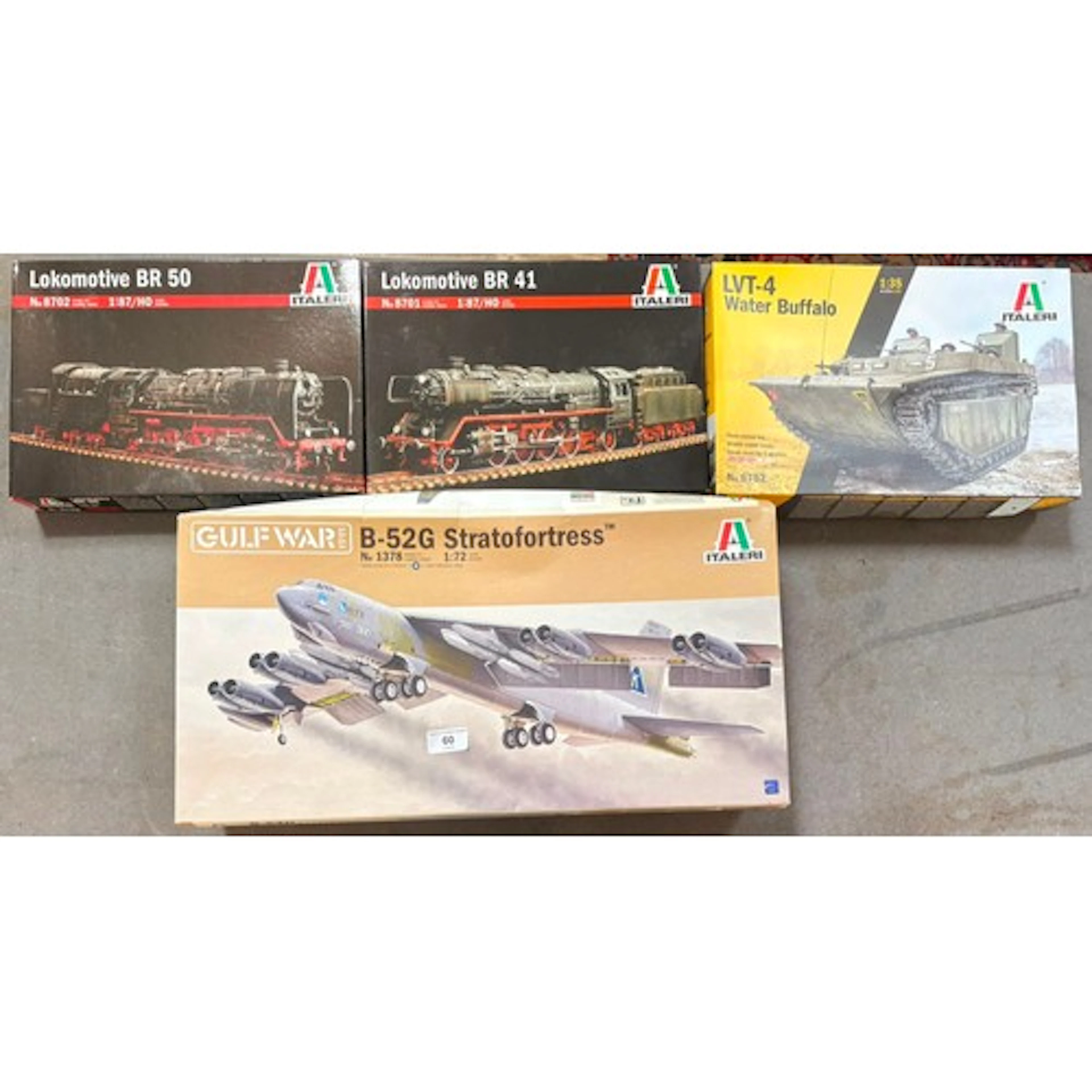 A group of four assorted Italeri model kits (2 x 1:87 scale ...