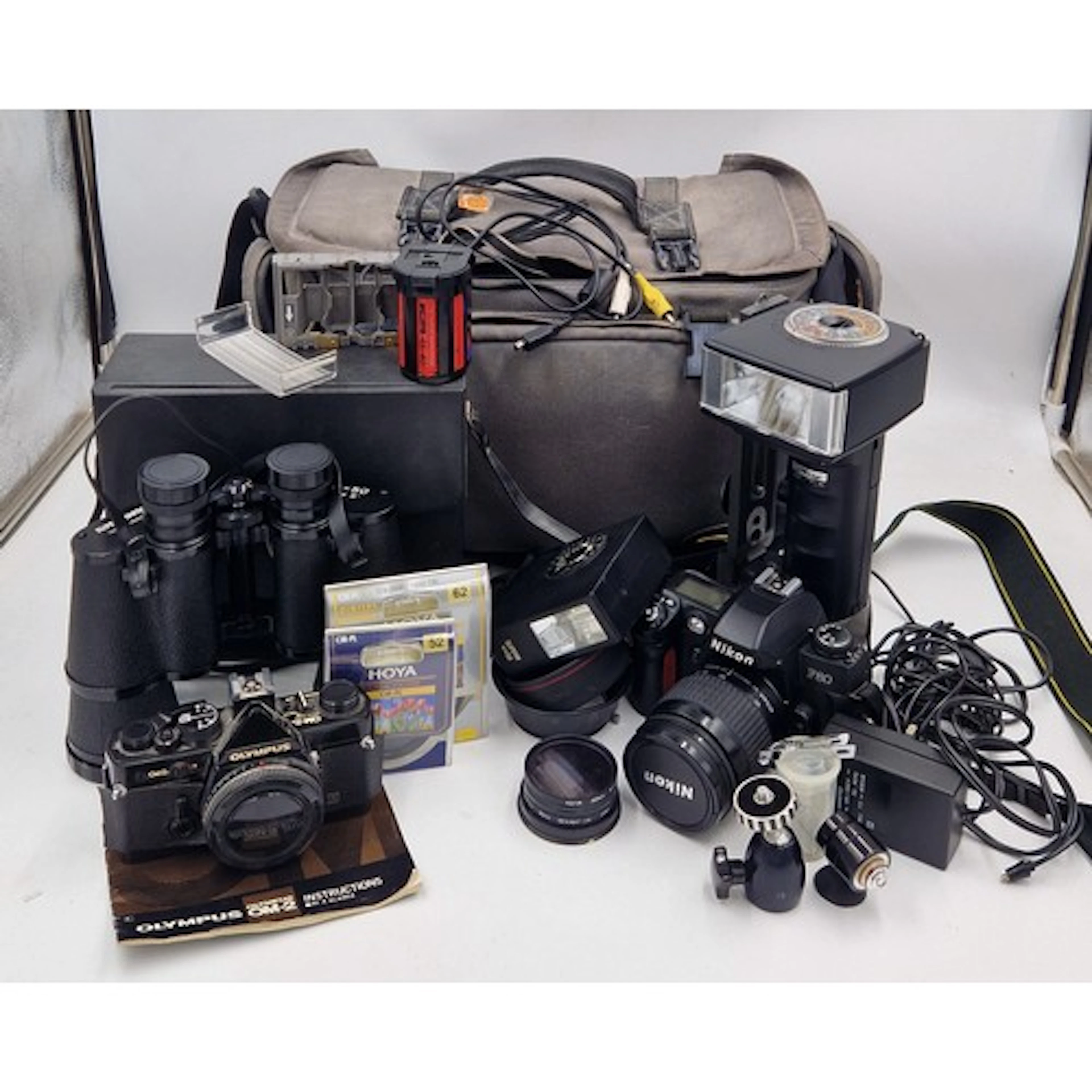 Photography equipment to include a Nikon F80 35mm SLR camera...