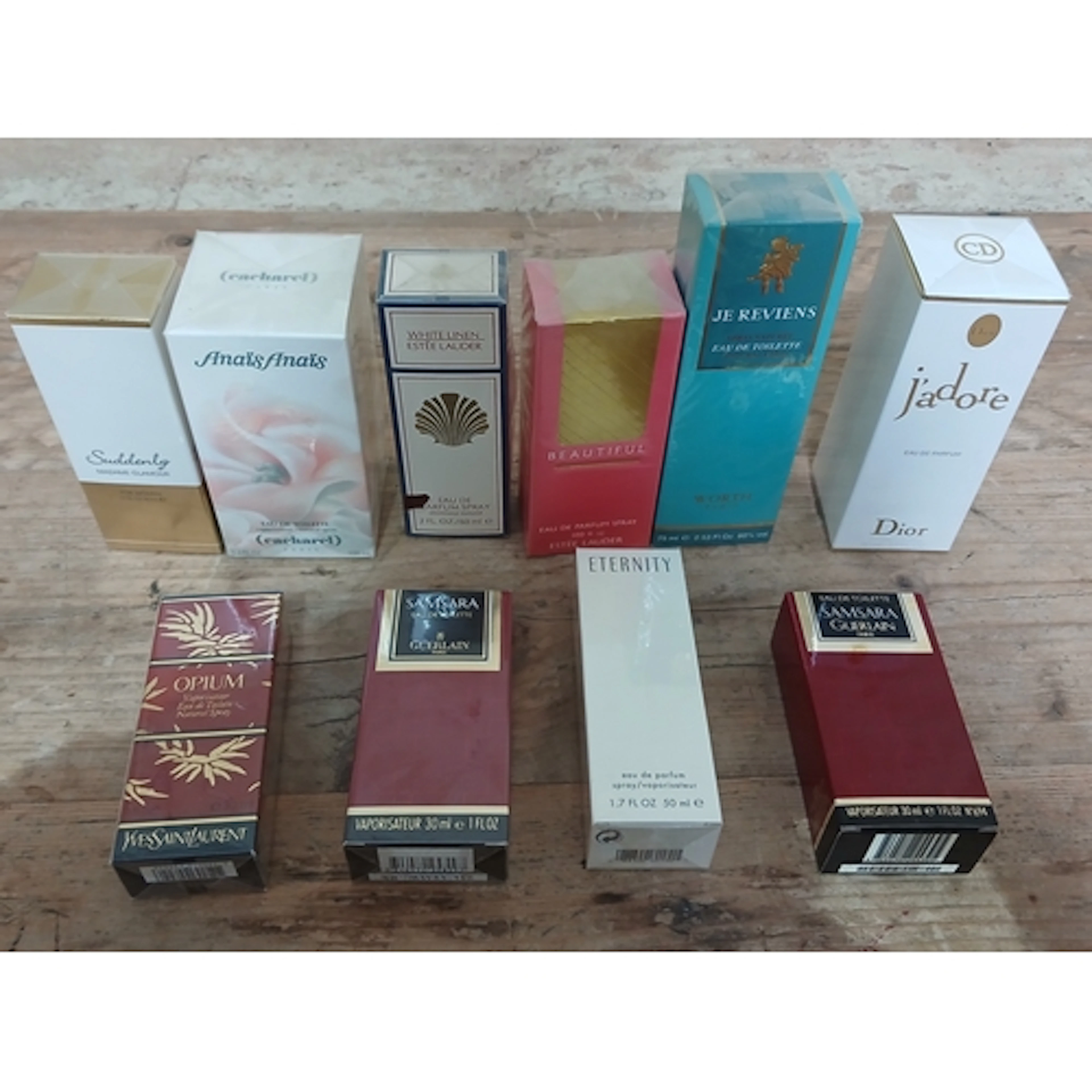 Ten sealed bottles of assorted perfume including Christian D...