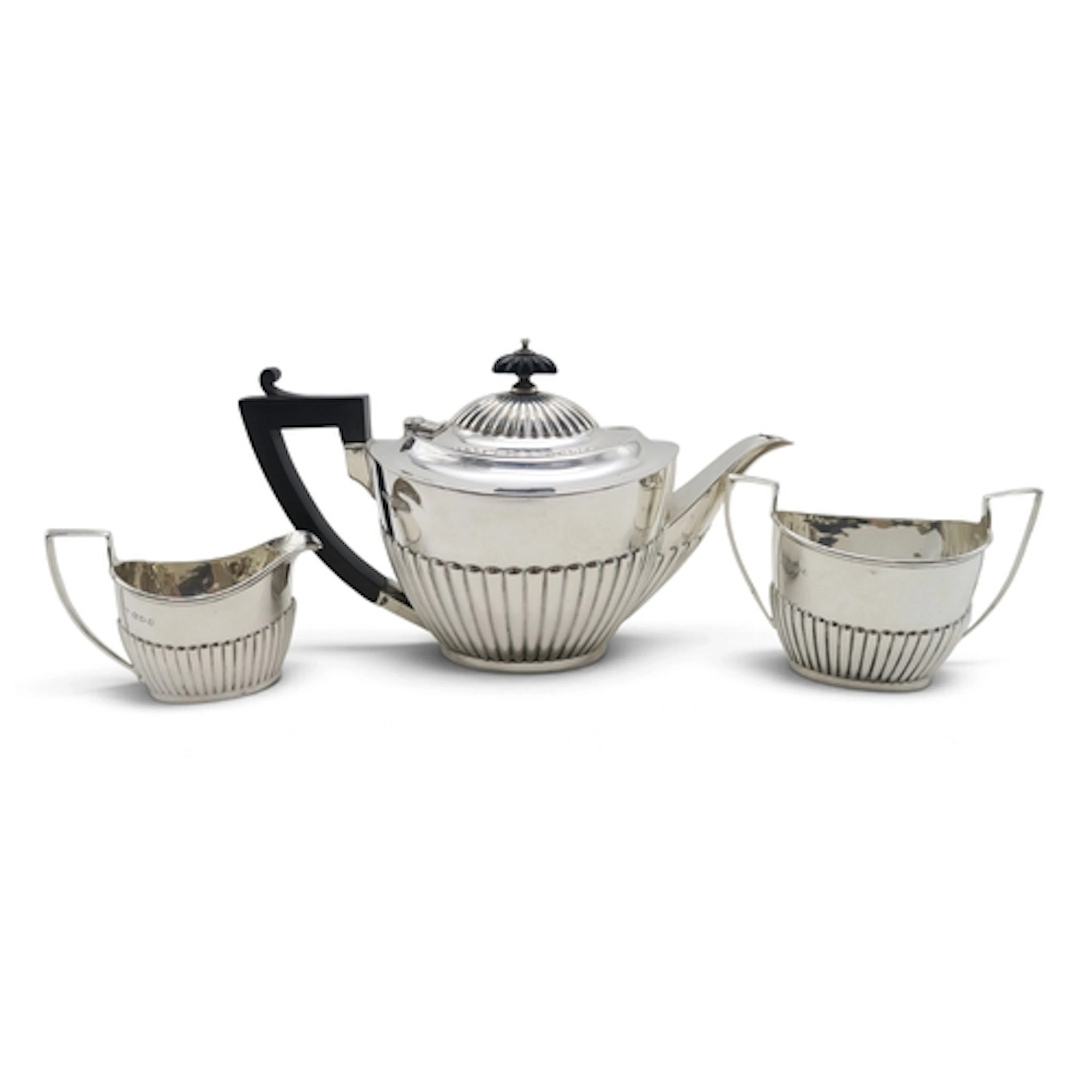 A matched late-Victorian three-piece silver tea service, the...