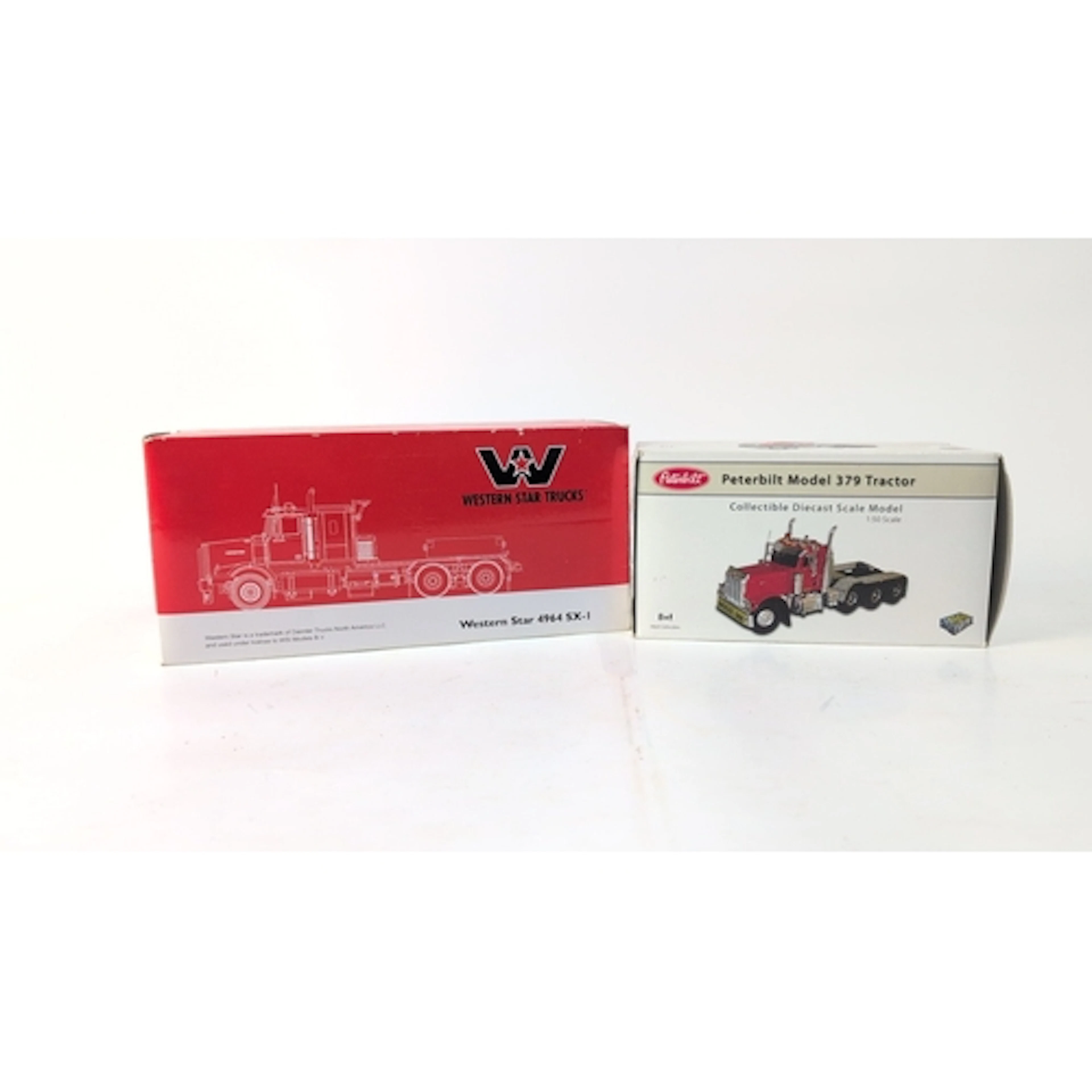 A pair of 1:50 scale diecast tractor-unit models, comprising...