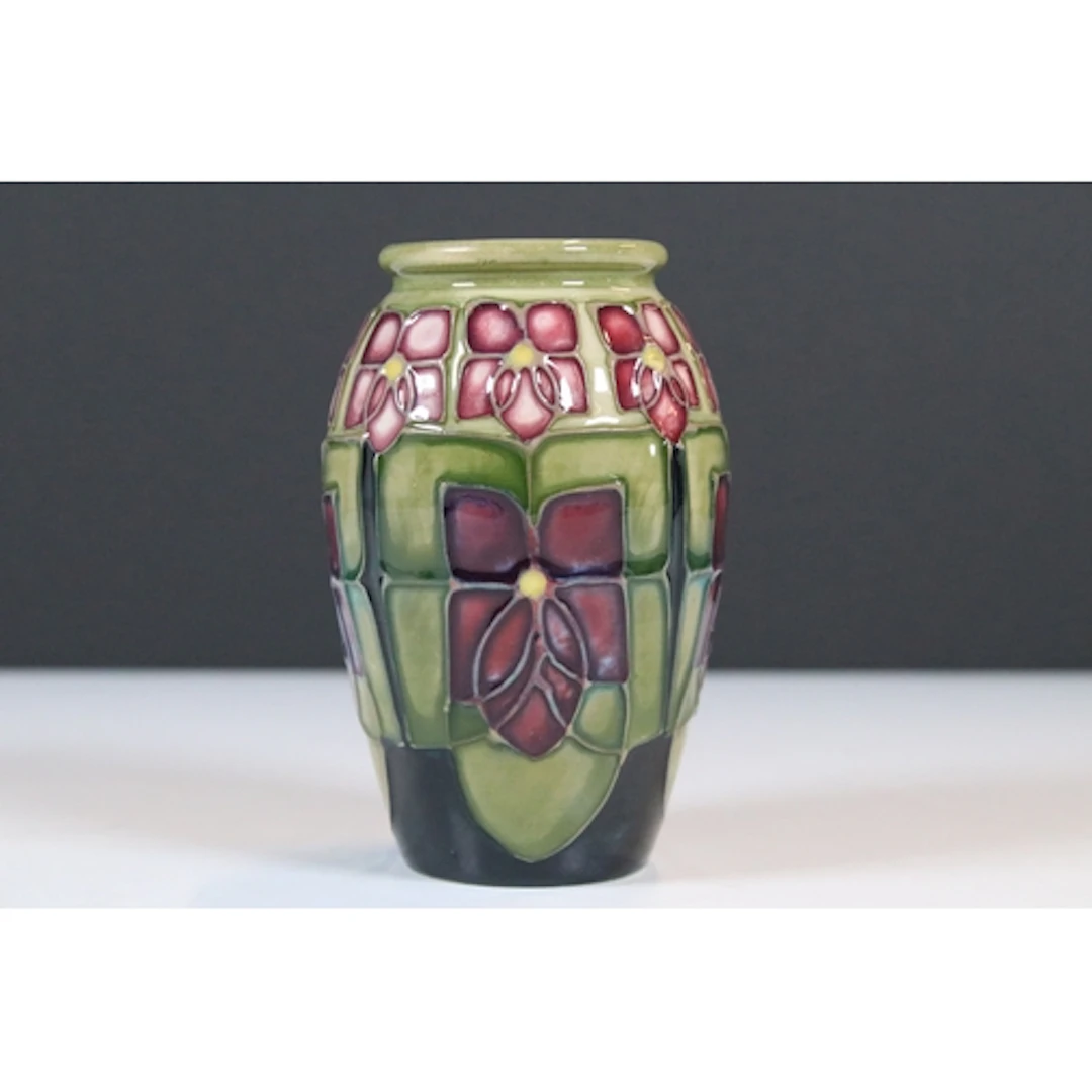 Moorcroft pottery 'Violet' pattern vase, of ovoid form, desi...
